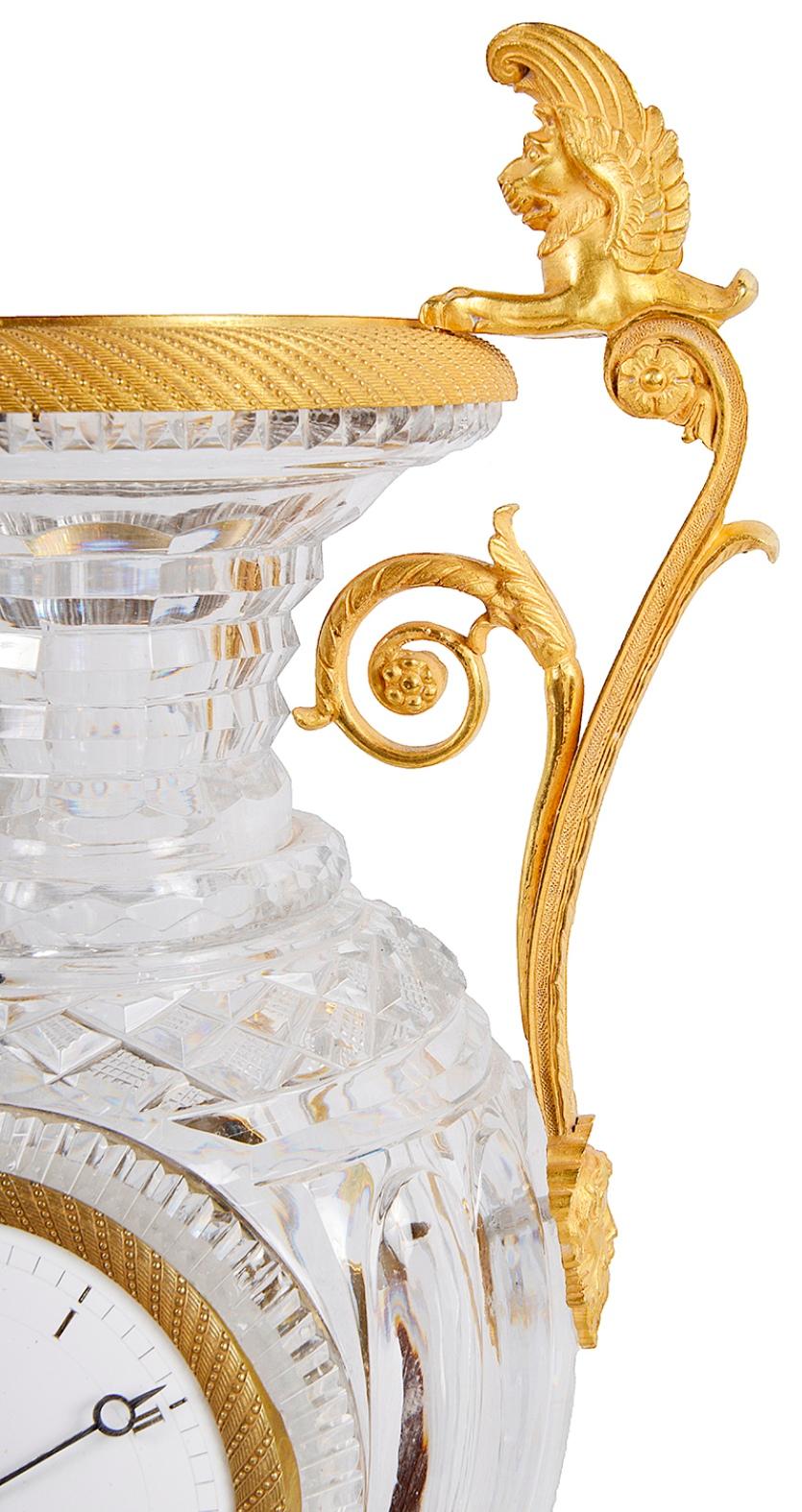 A beautiful French cut-glass and gilded ormolu Louis XVI style urn mantel clock. Measures: 41cm (16