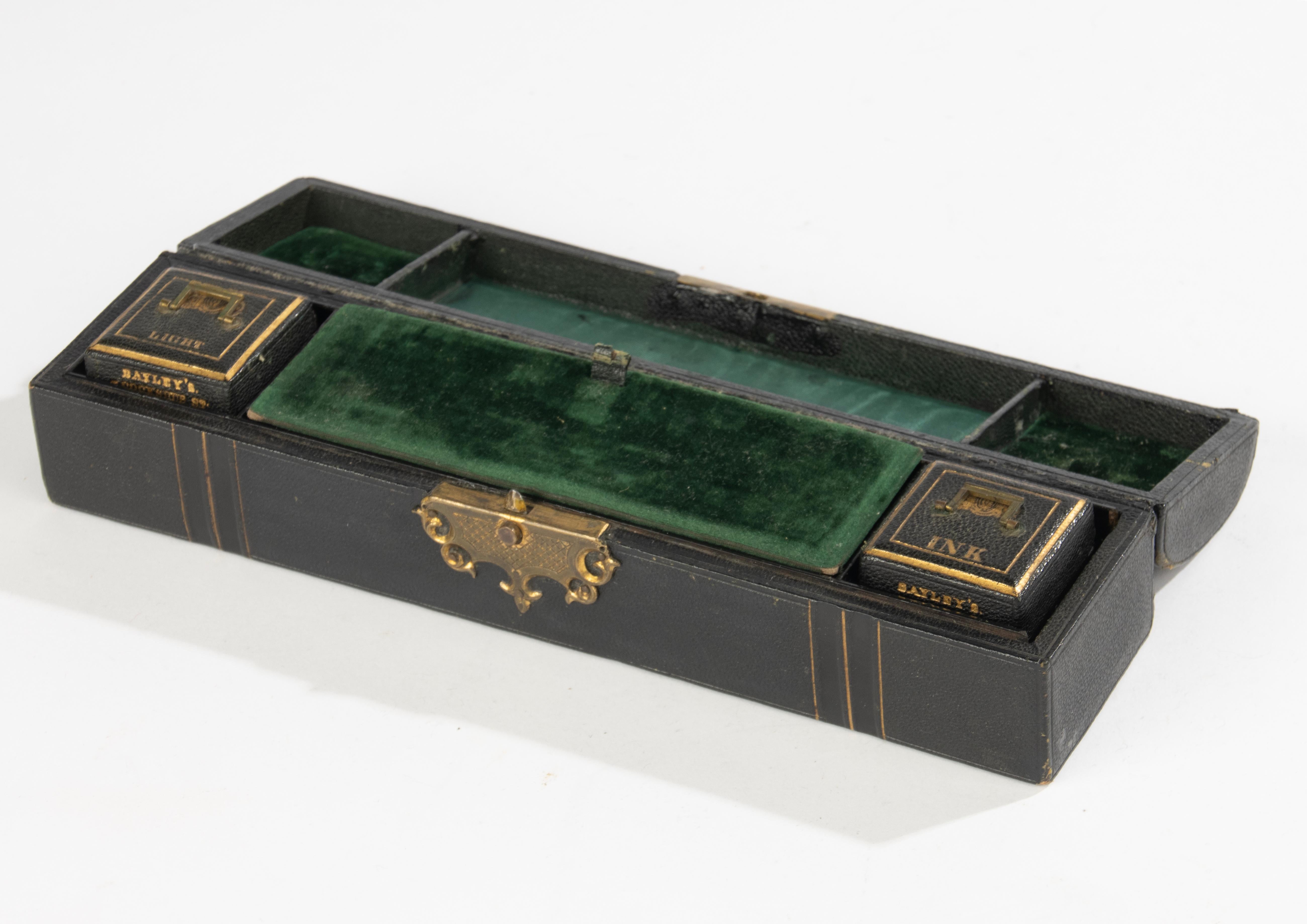 A beautiful antique desk box. Made of wood, covered with leather with beautiful gold details. Fine copper fittings.
The interior has two small boxes, for ink and for matches. In the middle there is a compartment for storing pens, for example.
The