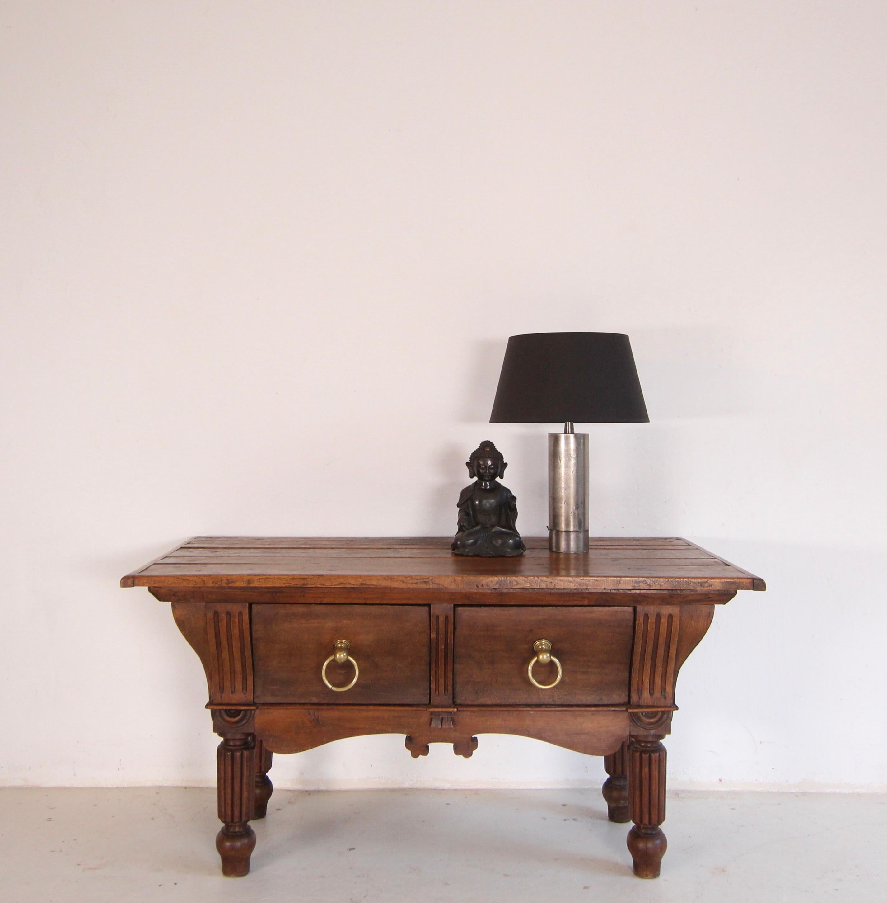 A freestanding double-sided Louis Philippe butcher's table or former butcher's block from the late 19th century. Made of solid beech wood and oak. Ready for everyday use.

Beechwood body standing on four legs, curved on all sides with all-round