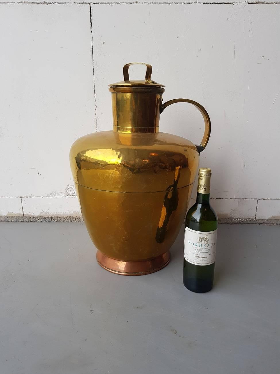 Large and decorative 19th century Dutch copper and brass milk can.

The measurements are,
Depth 35 cm/ 13.7 inch.
Width 35 cm/ 13.7 inch.
Height 53 cm/ 20.8 inch.
   