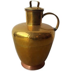 Pot à lait en cuivre et laiton de la fin du 19ème siècle.