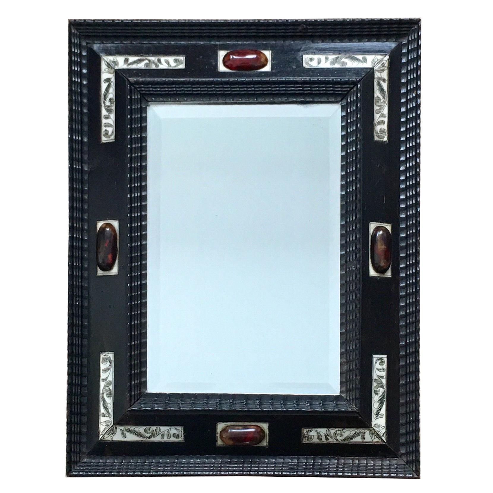 Late 19th century Dutch ebonised ripple frame style mirror  For Sale