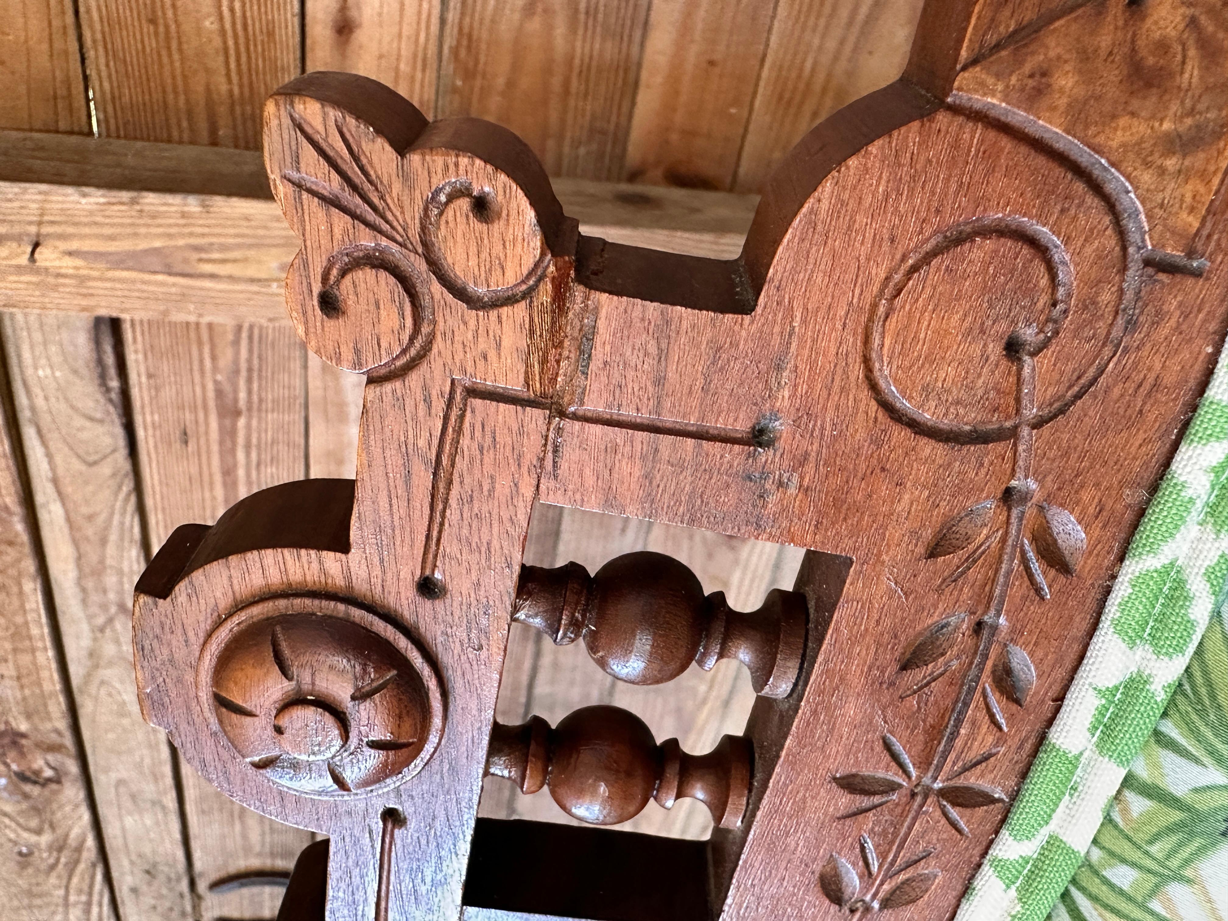 This elegant set of four Eastlake dining chairs from the late 19th century showcases the intricate craftsmanship characteristic of the Eastlake style.
The carved walnut frames feature detailed ornamentation, including spindle accents and geometric