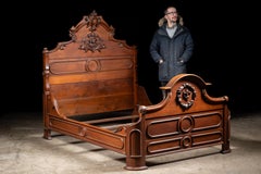 Late 19th Century Eastlake Victorian Walnut Bedframe