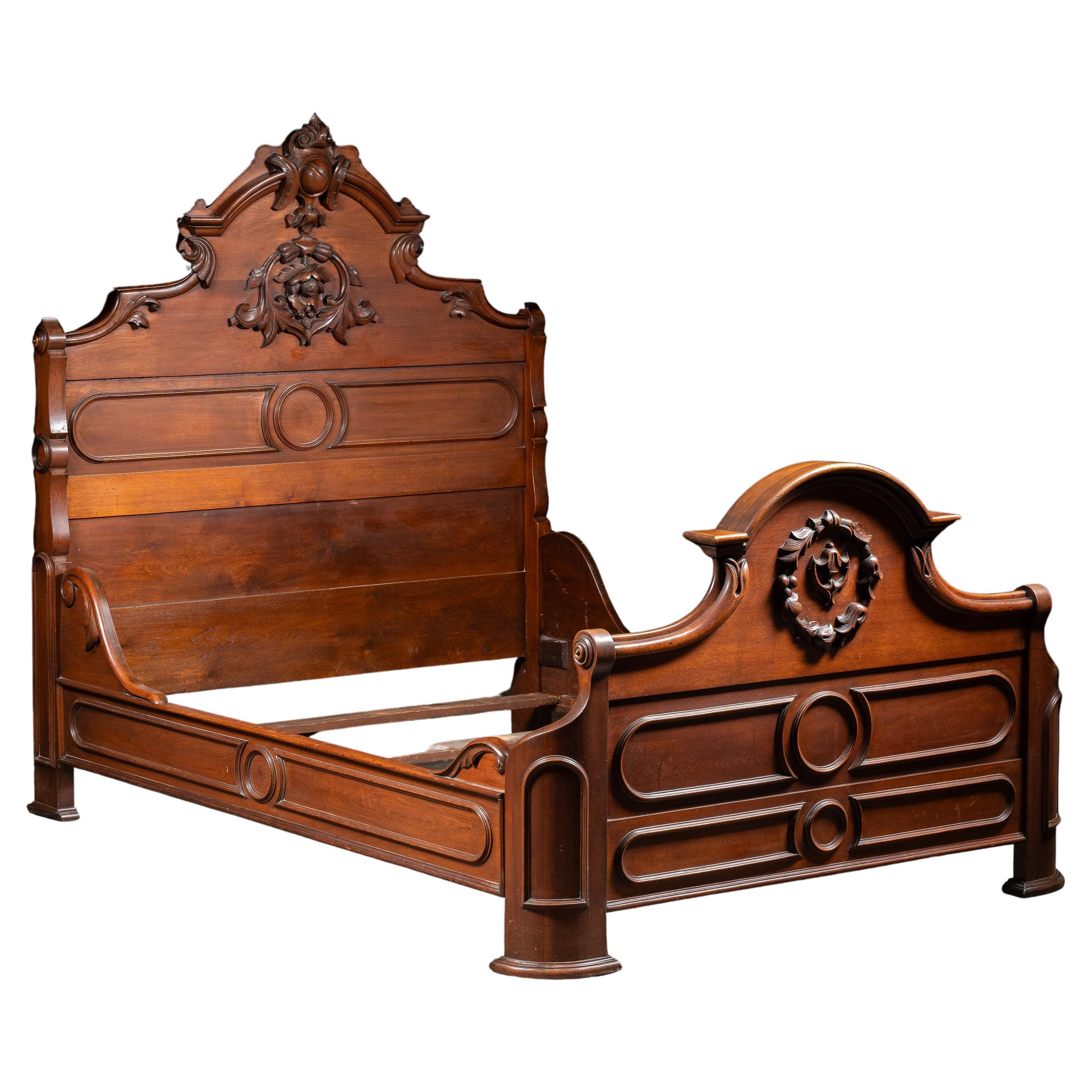 Late 19th Century Eastlake Victorian Walnut Bedframe