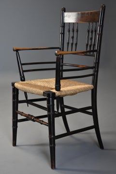 Late 19th Century Ebonized Sussex Armchair Attributed to Morris & Co