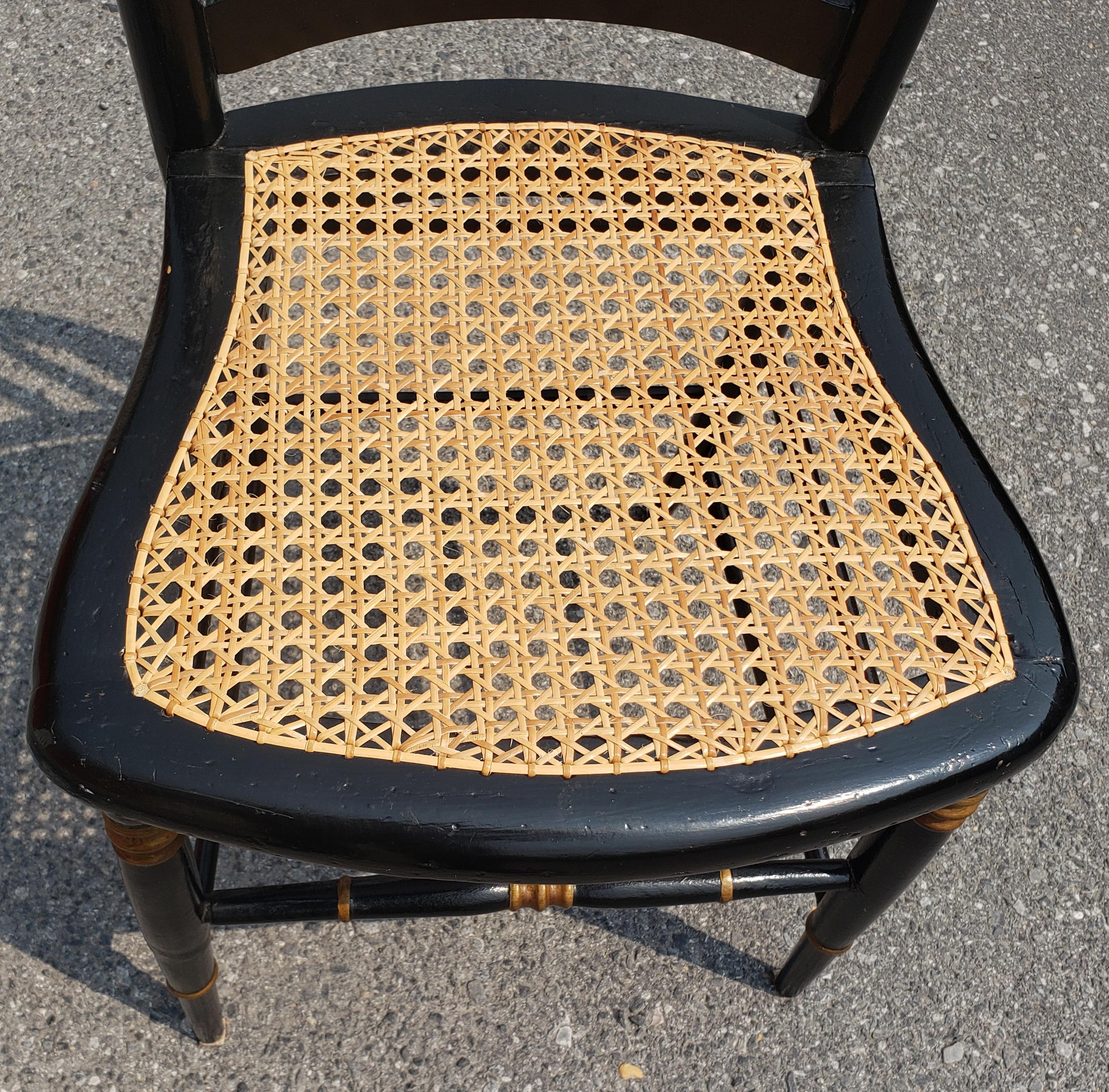 Victorian Late 19th Century Ebonized and Parcel Gilt Decorated Cane Seat Side Chair For Sale