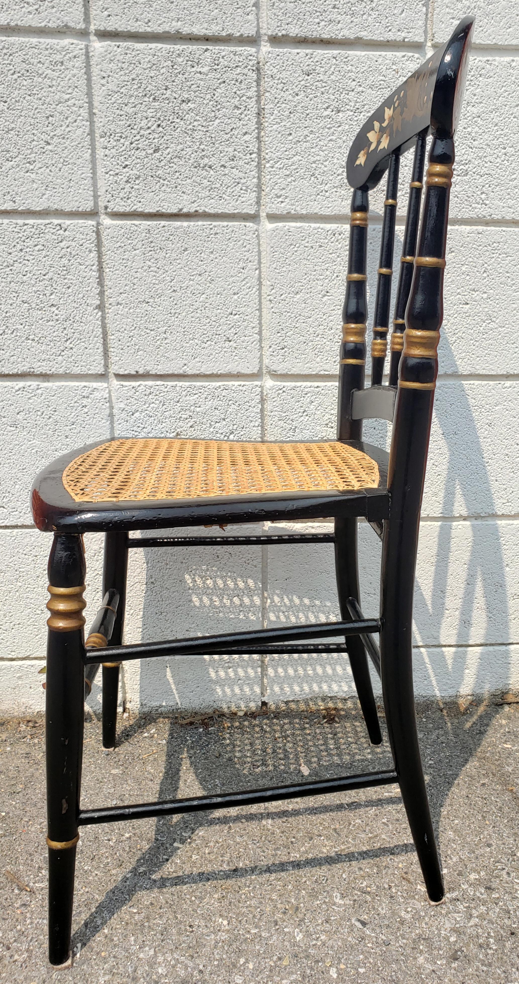 Late 19th Century Ebonized and Parcel Gilt Decorated Cane Seat Side Chair In Good Condition For Sale In Germantown, MD