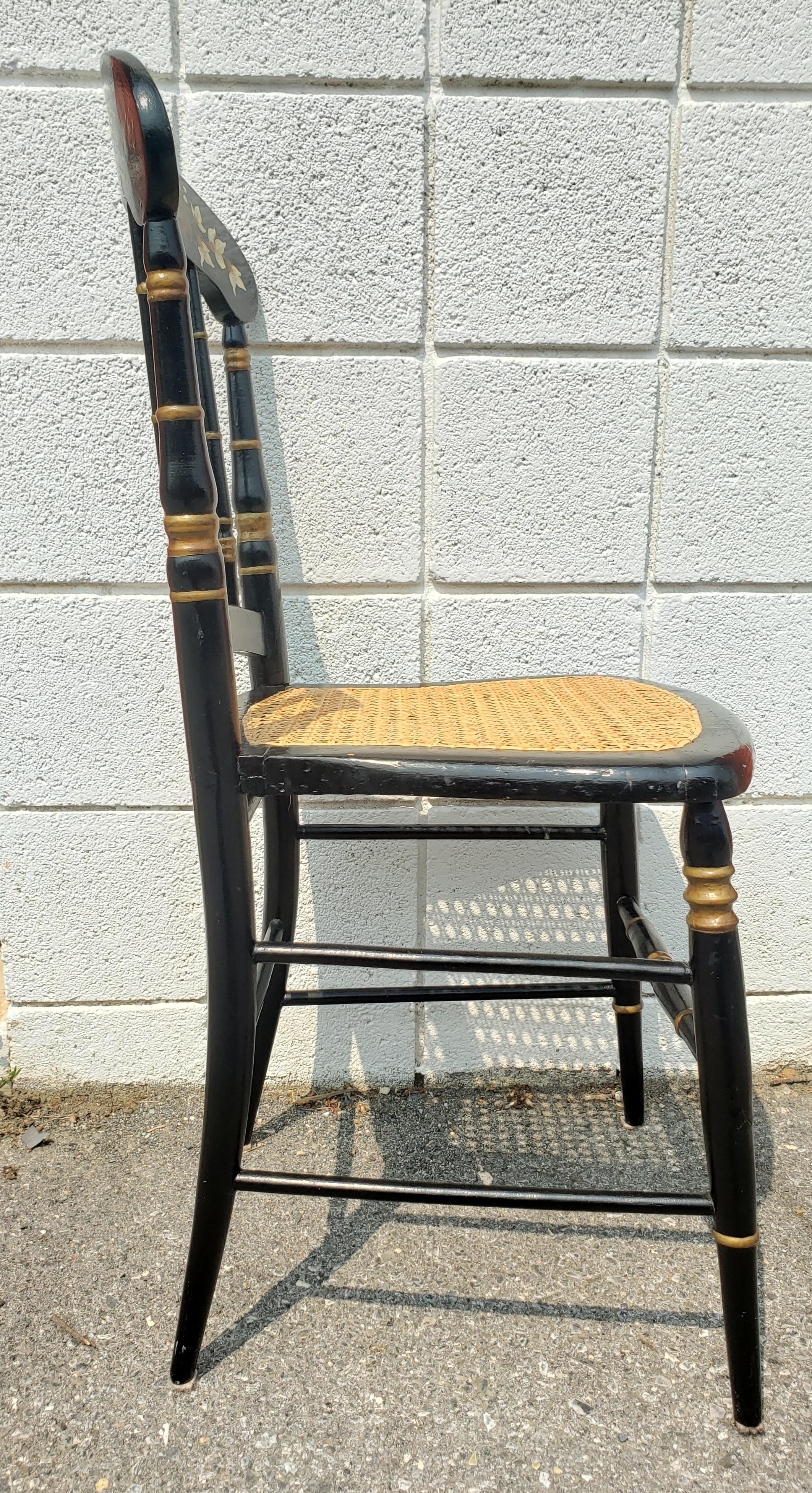 20th Century Late 19th Century Ebonized and Parcel Gilt Decorated Cane Seat Side Chair For Sale
