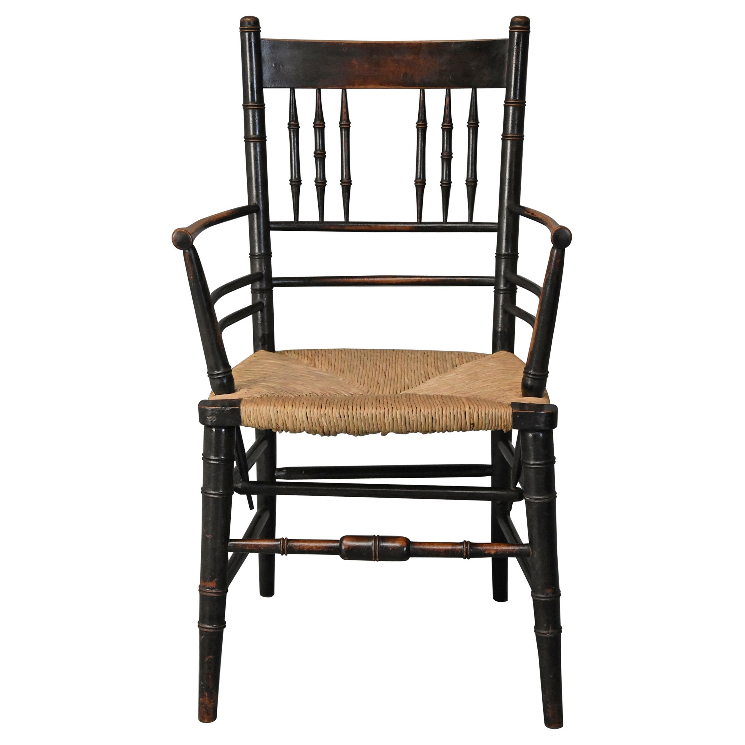 Late 19th Century Ebonized Sussex Armchair Attributed to Morris 
Co