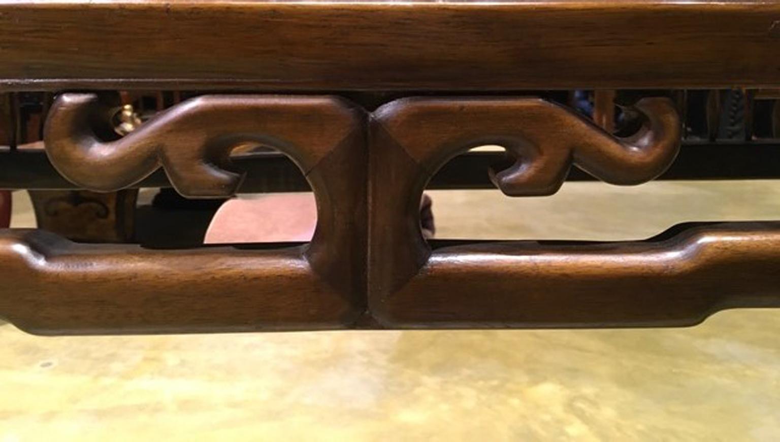 This elegant elmwood console is handcrafted and so the beautiful details under the top and to the corners, both the sides. This is a piece of glamorous timeless 

The top is in solid elmwood.
Never restored, no losses.
With certificate of