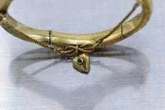 Late 19th Century Emerald, Diamond, and Gold Hand Bangle