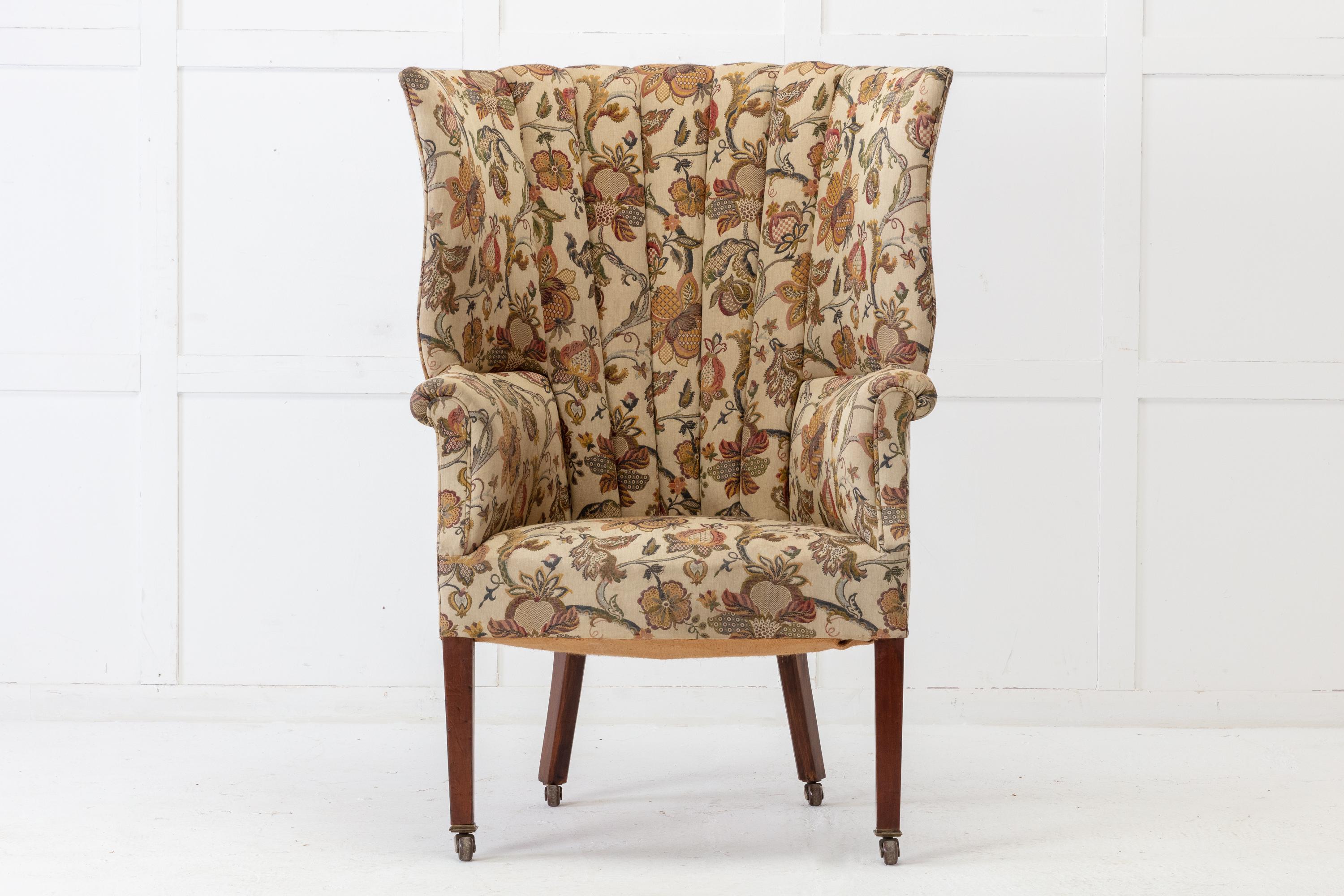 Late 19th century English barrel back armchair, having a high back and wings over enclosed arms. Raised on slender straight legs and terminating in brass castors.

Good strong frame left in old fabric ready for reupholstery or to keep as it is.
  