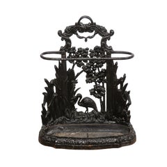 Late 19th Century English Black Painted Iron Umbrella Stand with Bird