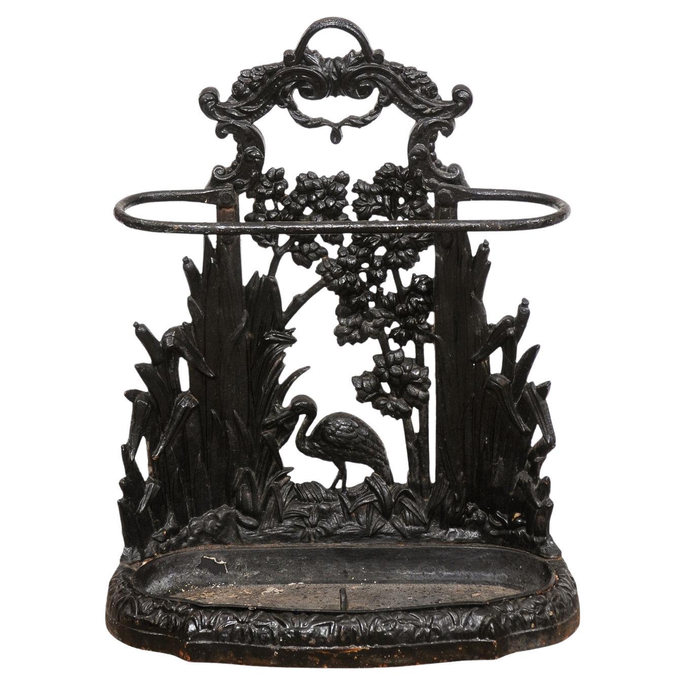 Late 19th Century English Black Painted Iron Umbrella Stand with Bird For Sale