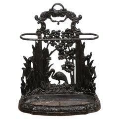 Used Late 19th Century English Black Painted Iron Umbrella Stand with Bird