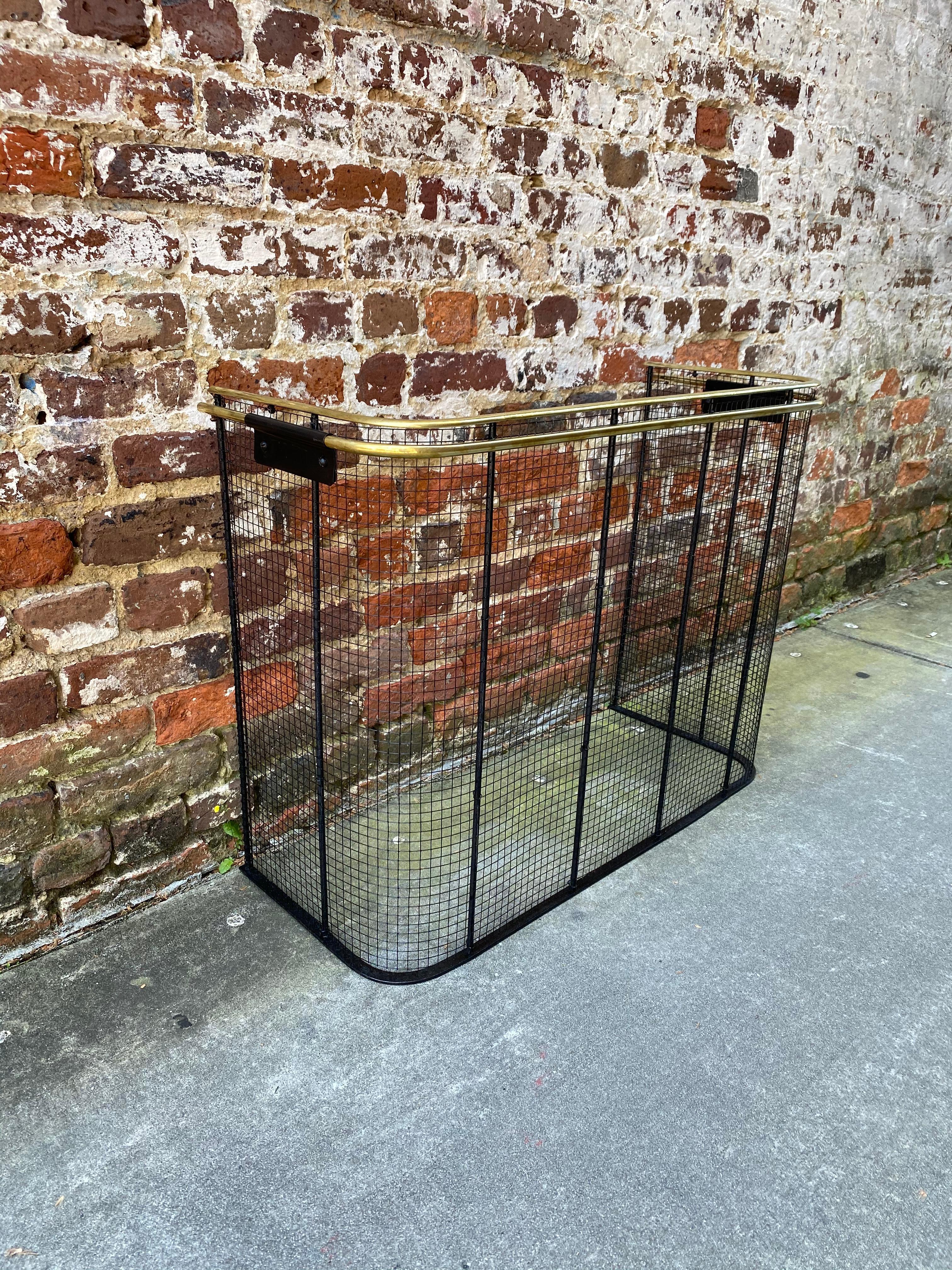 Late 19th century English brass and wire nursery fender with drying bar.