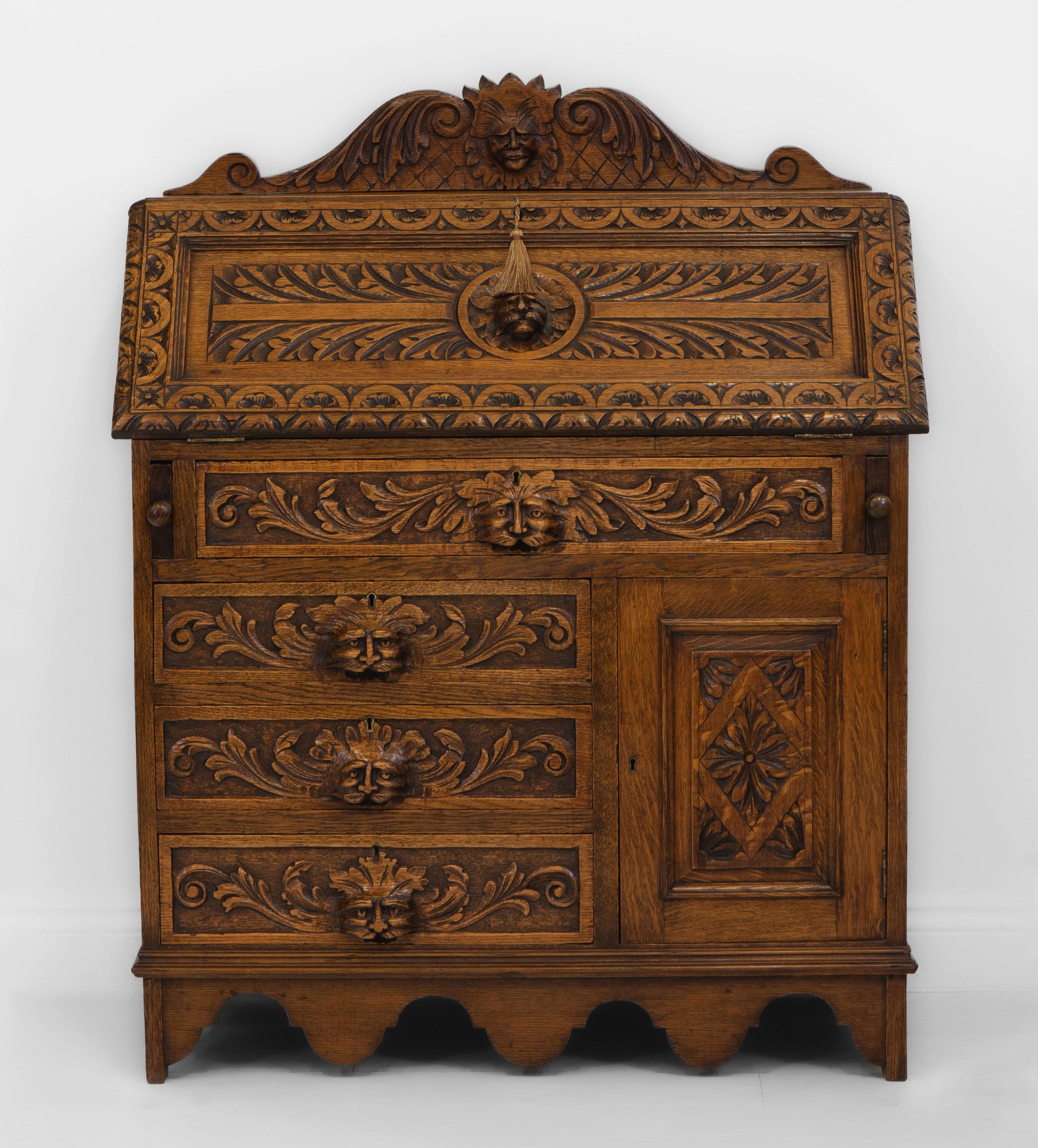 Victorian Late 19th Century English Carved Oak Green Man Bureau Desk For Sale