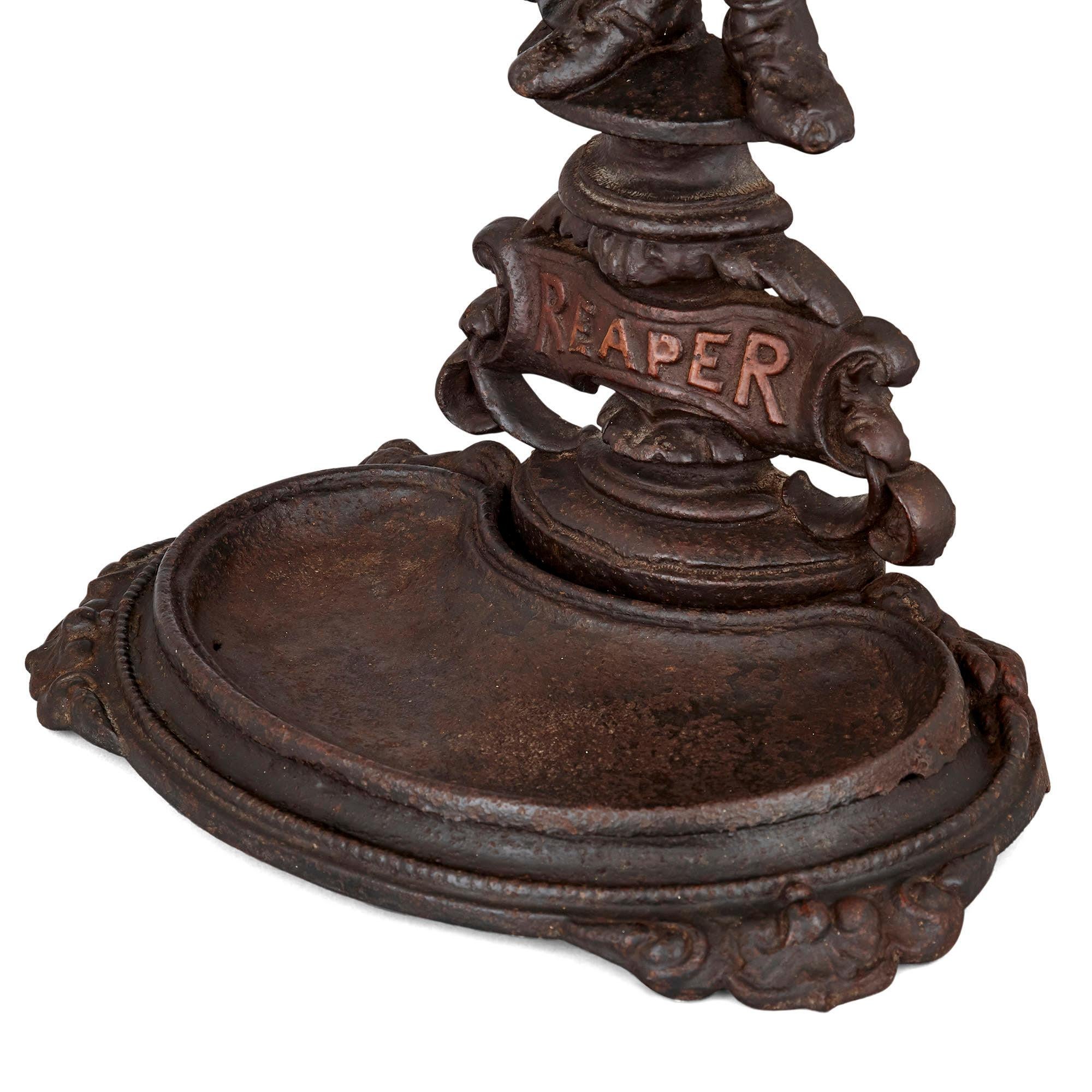This figure carrying wheat on his back is made of cast iron, written on its base is 'Reaper'. Figures such as these were commonly found in late Victorian houses to hold walking sticks and umbrellas.
English, circa 1880
Measures: Height 77cm, width