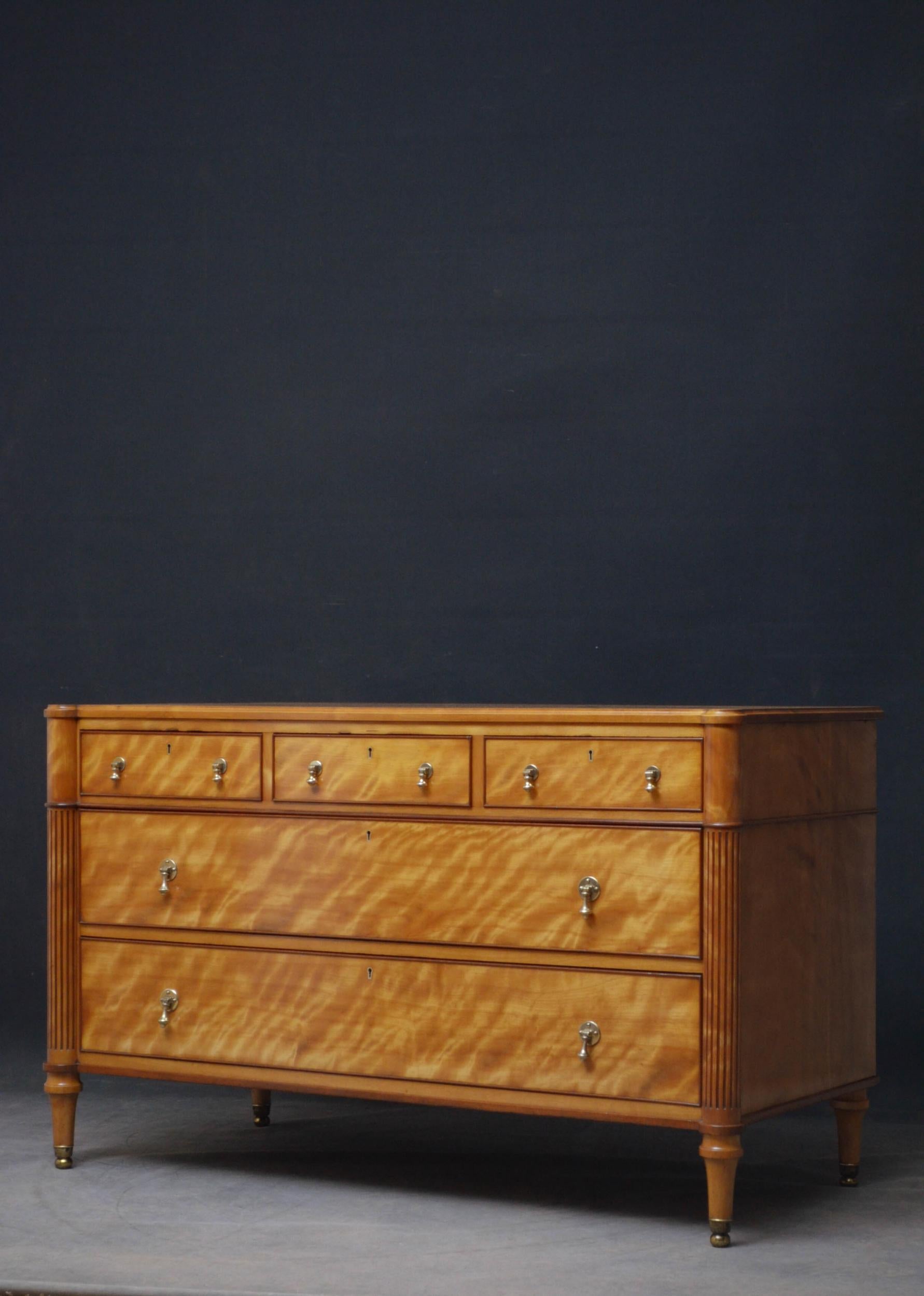 Sn4931 Superb quality English satinwood chest of drawers of unusually low form, having attractive top with moulded edge above three short and two long cockbeaded and cedar wood lined drawers all fitted with original brass handles and flanked by