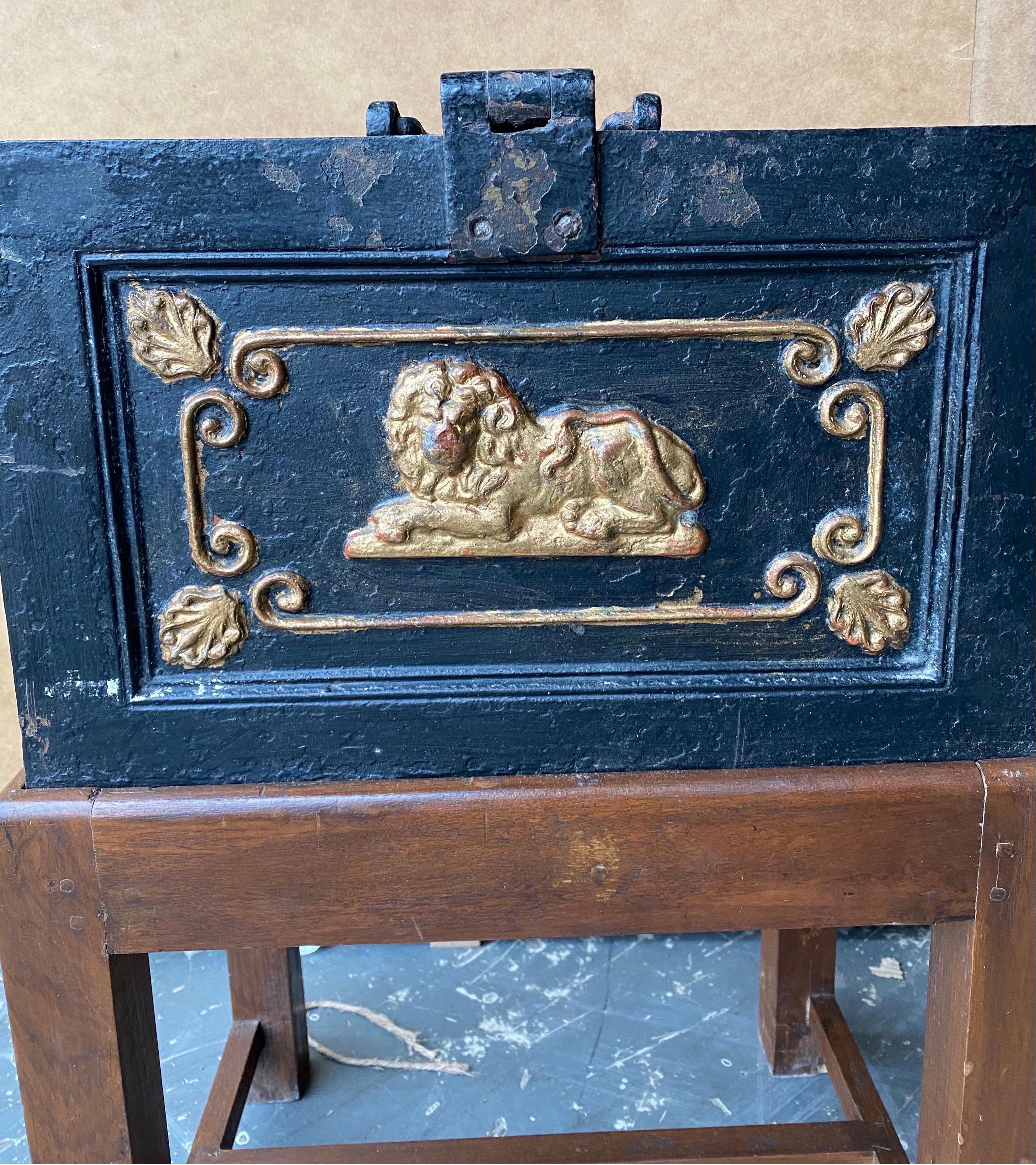 Late 19th century English iron strongbox mounted on a stand as a side table with original key. Crane foundries.