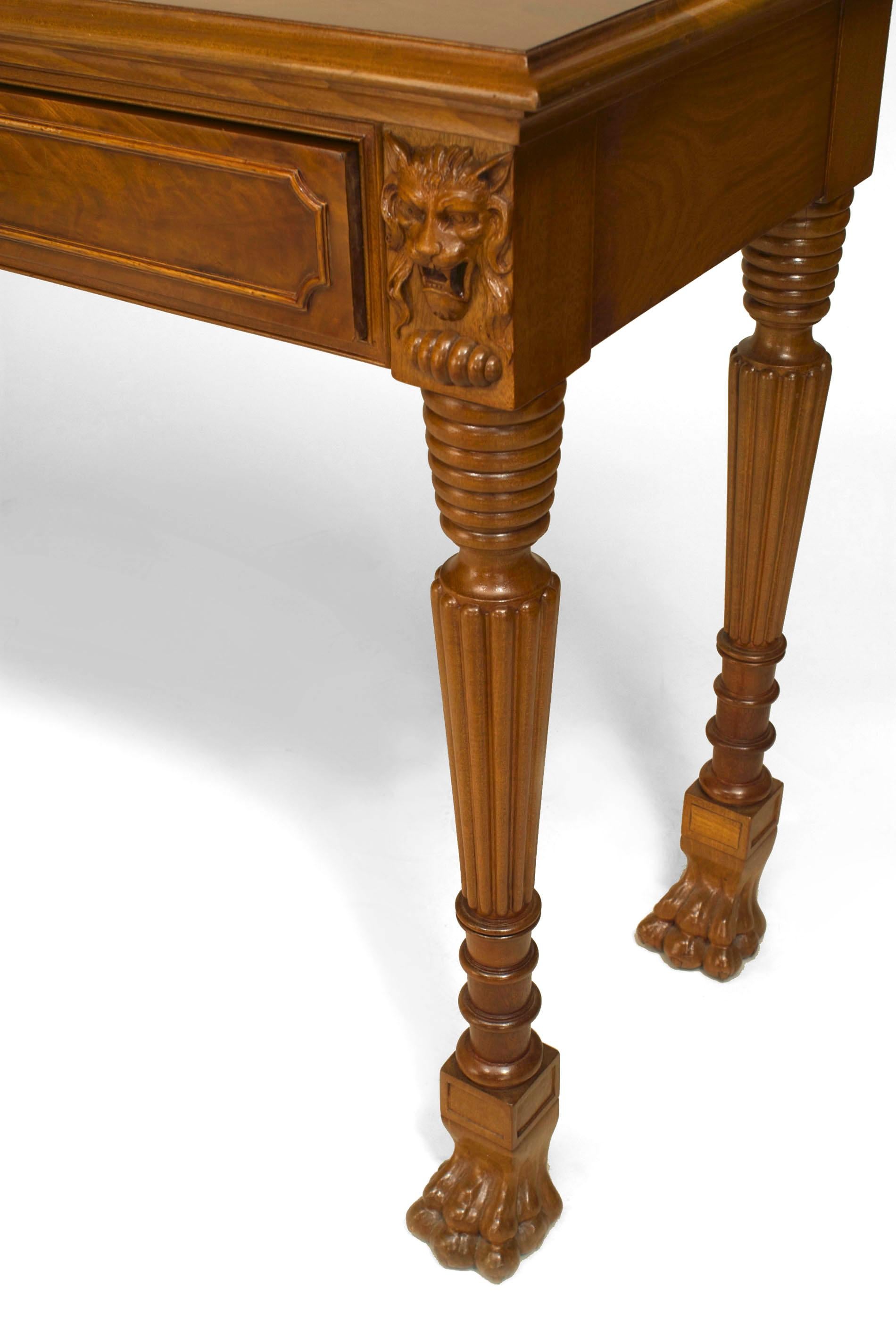 English Regency style (late 19th Cent) mahogany console table with fluted legs ending in lion paw feet and an apron with 2 felt lined drawers.
