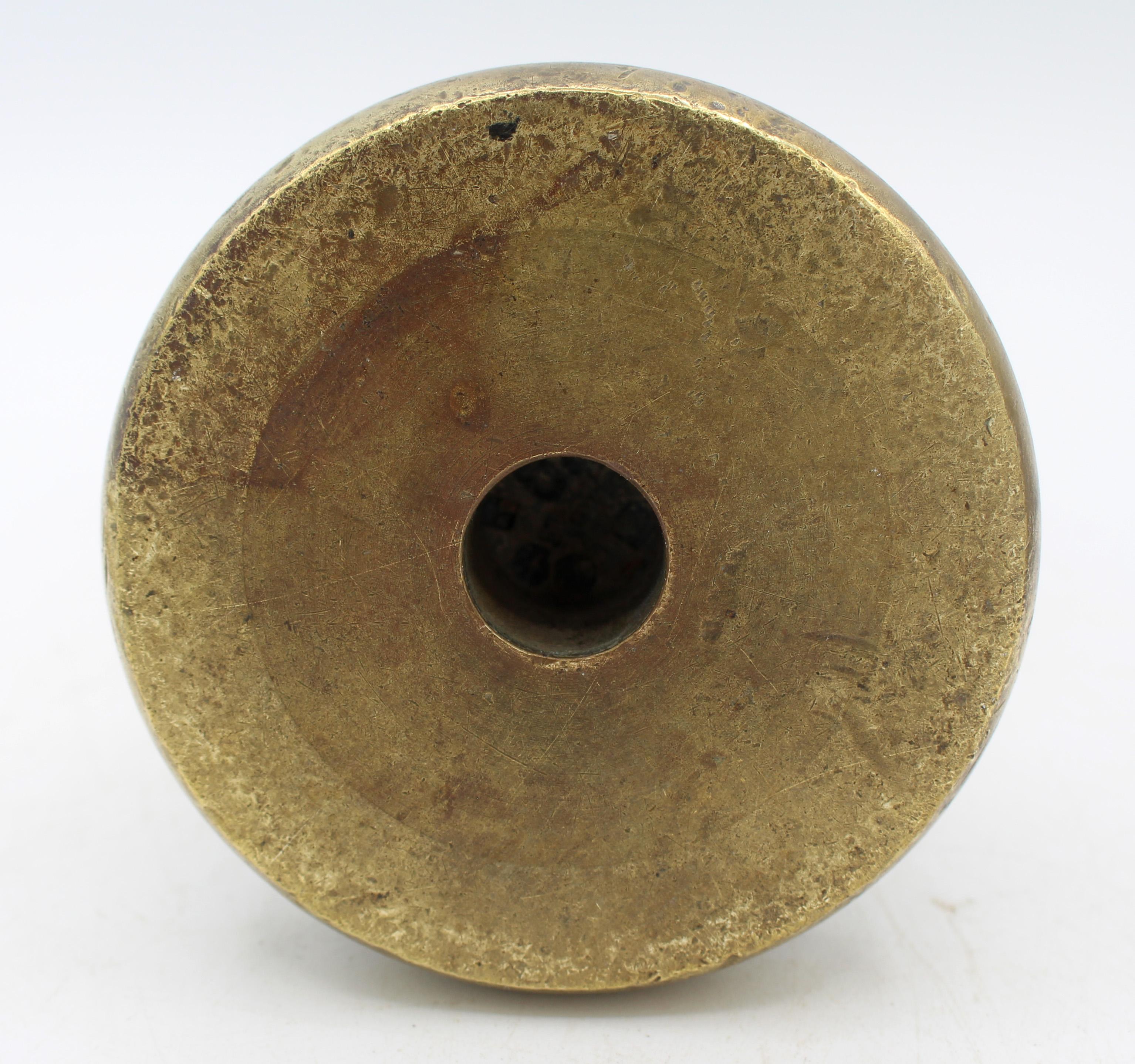 Late 19th century set of 5 brass bell weights, English. An assembled set by W&T Avery, Birmingham, England. Includes: 7lb., 4lb., 2lb., 1lb, & 8 oz. sizes. Two smallest are not marked by the maker. Only the smallest retains the lead insert for