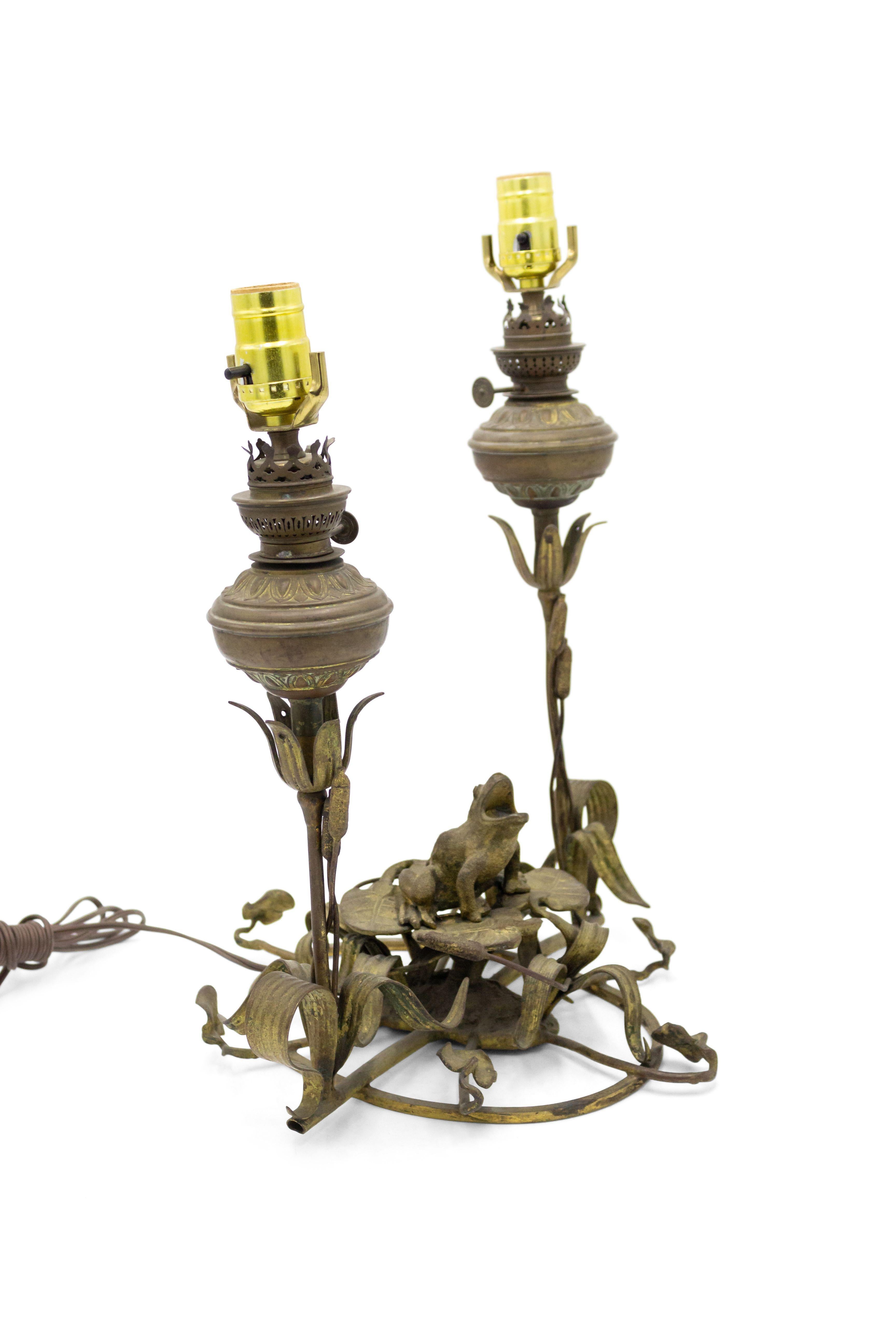 Late 19th century English Victorian bronze and gilt double-light table lamp with frog on lily pad.
 