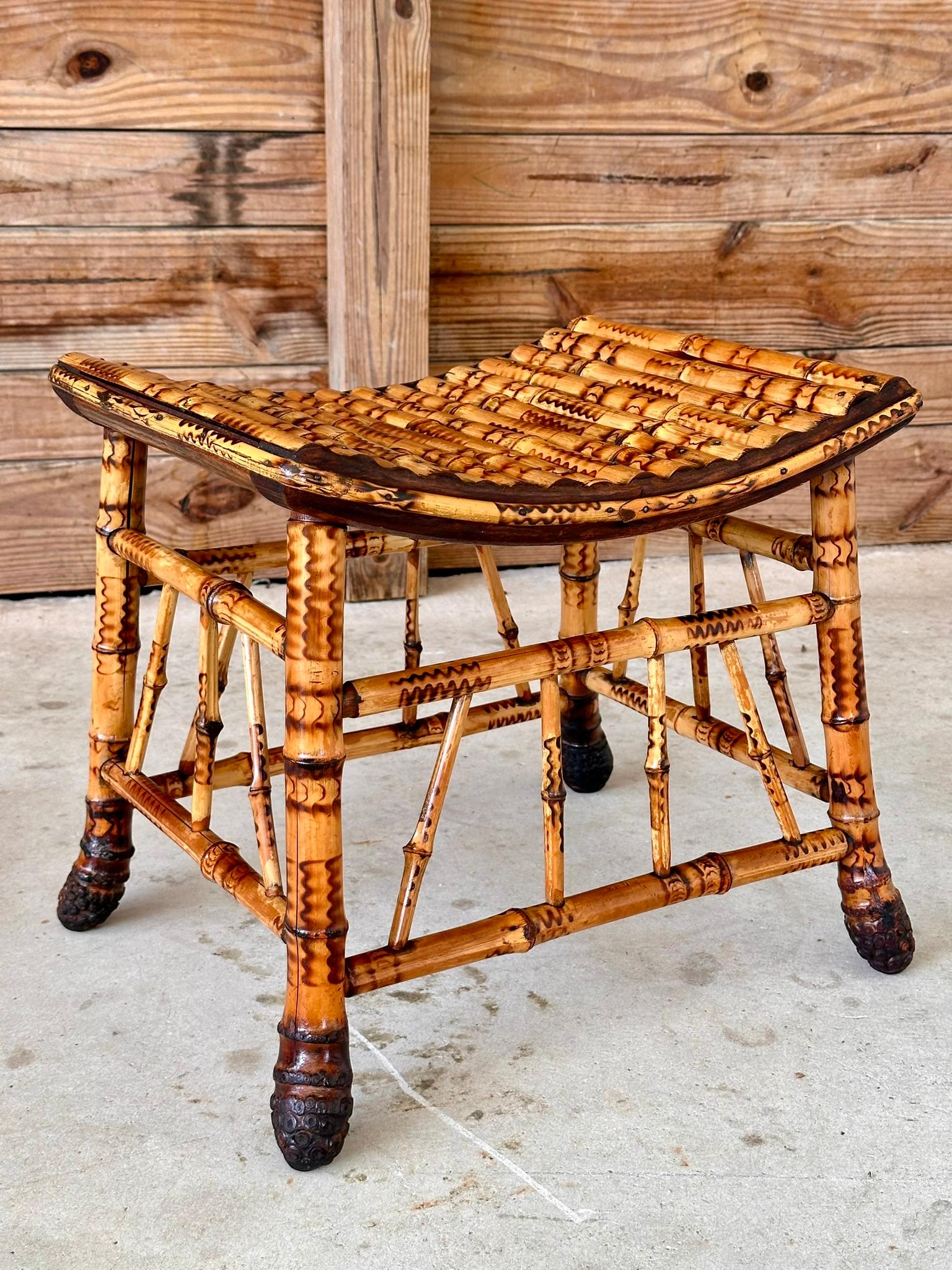 This exquisite Late 19th Century English Victorian Thebes bench showcases the elegance of the period with its intricately designed bamboo structure.
Recently refinished to restore its original beauty, this versatile piece can serve as a bench,
