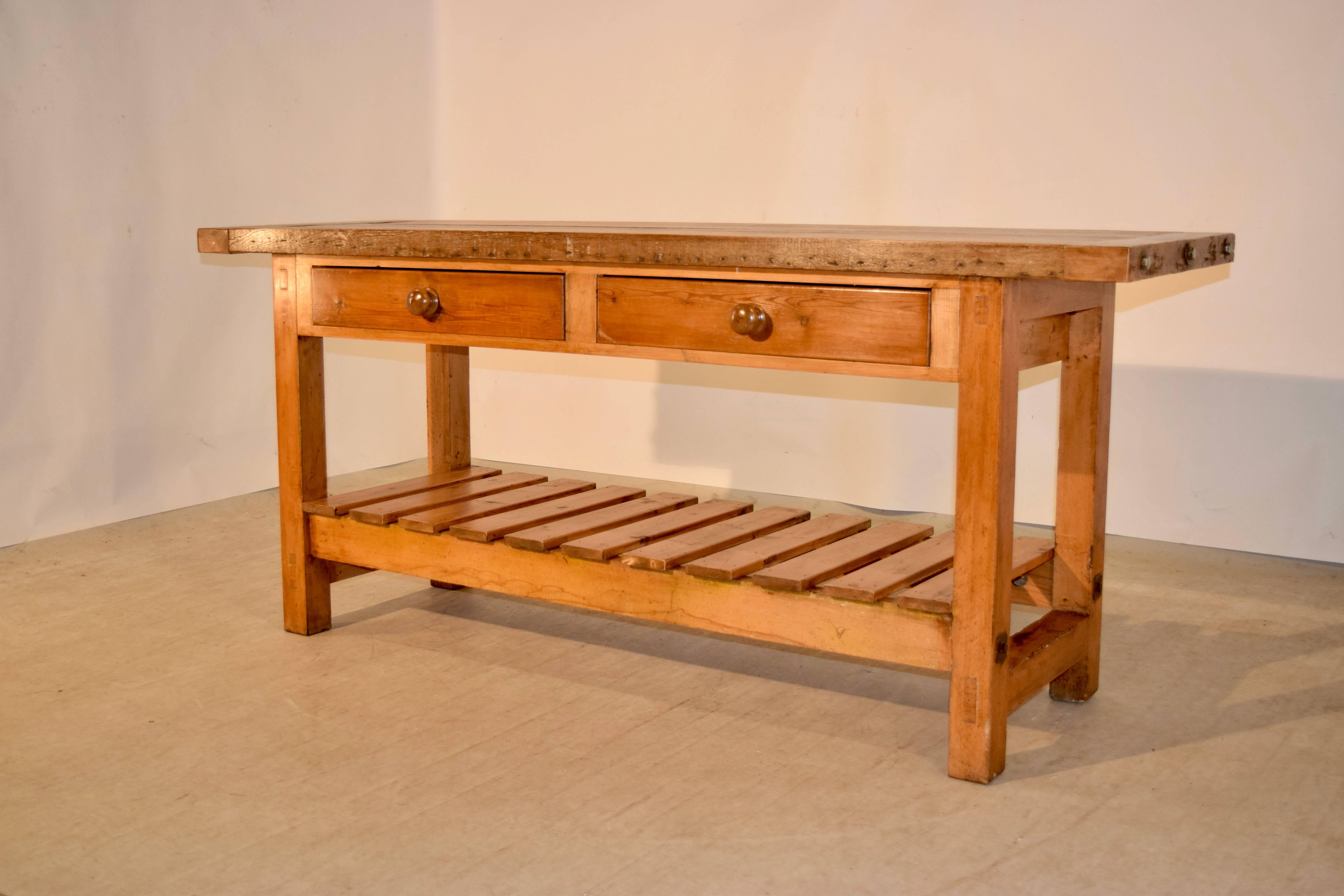 Late 19th century pine work table from England with a 2