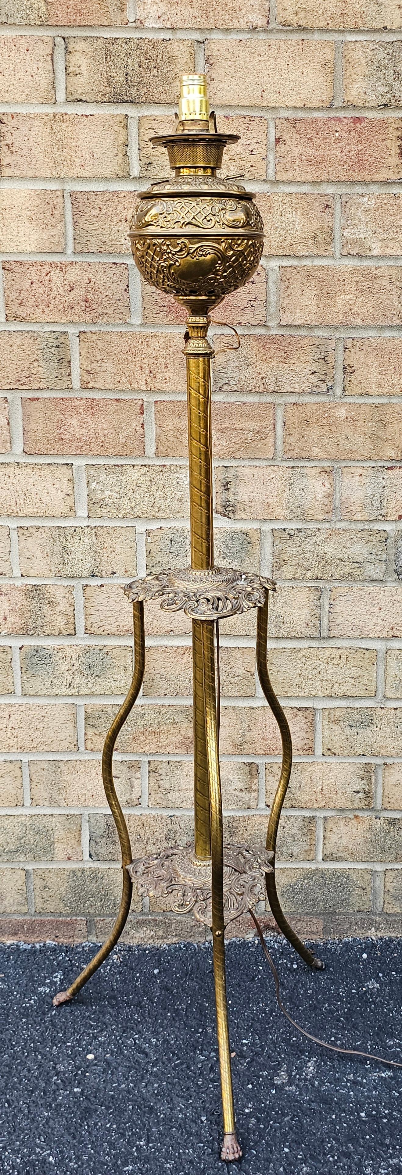 A Late 19th Century Etched Brass Piano Floor Lamp in great antique condition. Measures 19