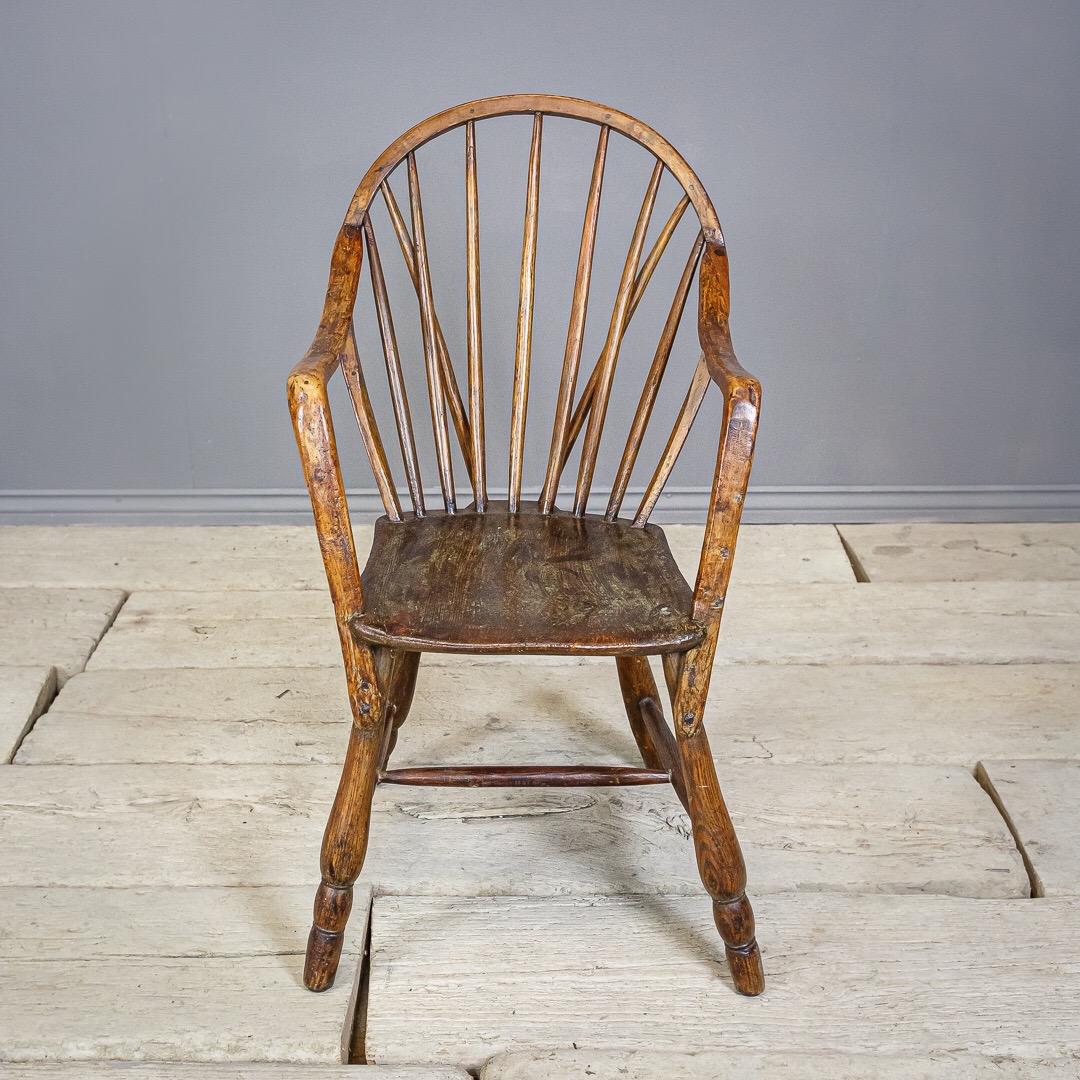 A wonderful simple Windsor chair with several 