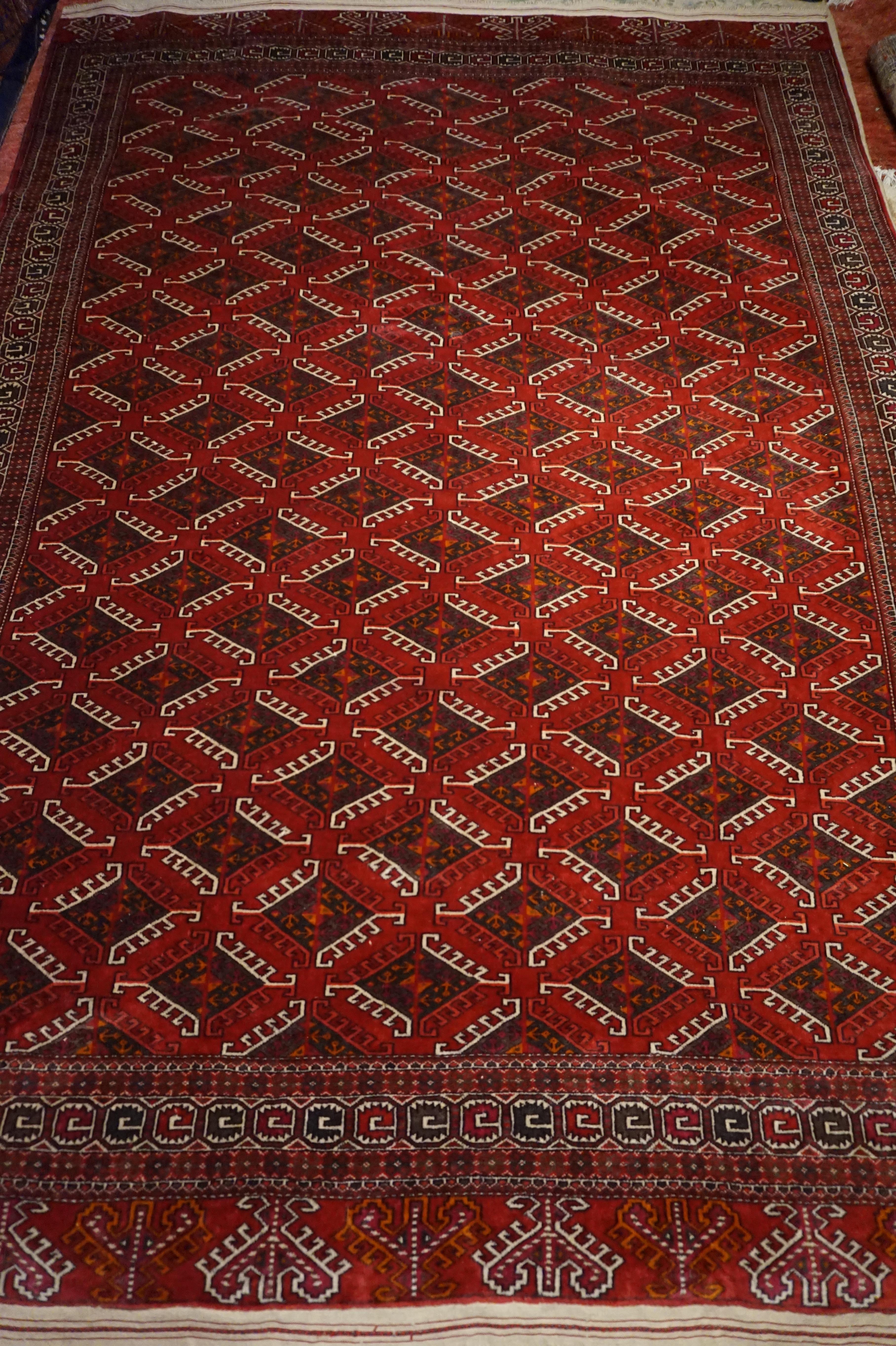 Very fne Turkmen tribal rug tightly hand knotted in soft, luxurious wool. Speaks for itself. The pile is in healthy condition. Excellent symmetry and vivid red shade. The fringe is intact. Presents well.