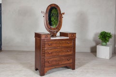 Late 19th Century Flaming Walnut Dresser with Tilting Mirror and Marble Inset