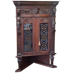 Antique Late 19th Century Flemish Carved Oak Corner Cabinet