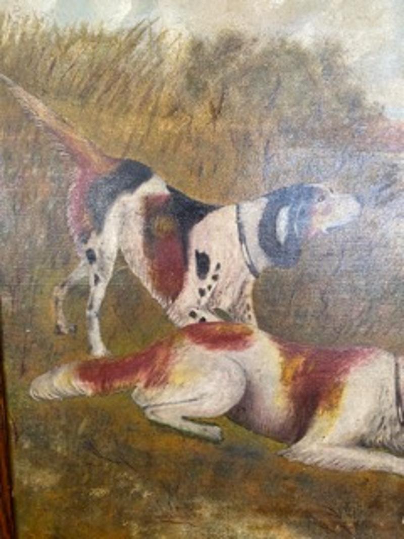 Quadro d'arte popolare della fine del XIX secolo con cornice in Wood raffigurante cani da caccia di River. I due cani stanno cacciando uccelli acquatici. La struttura in Wood è moderna. Stati Uniti, 1870-1900. Misure: 10
