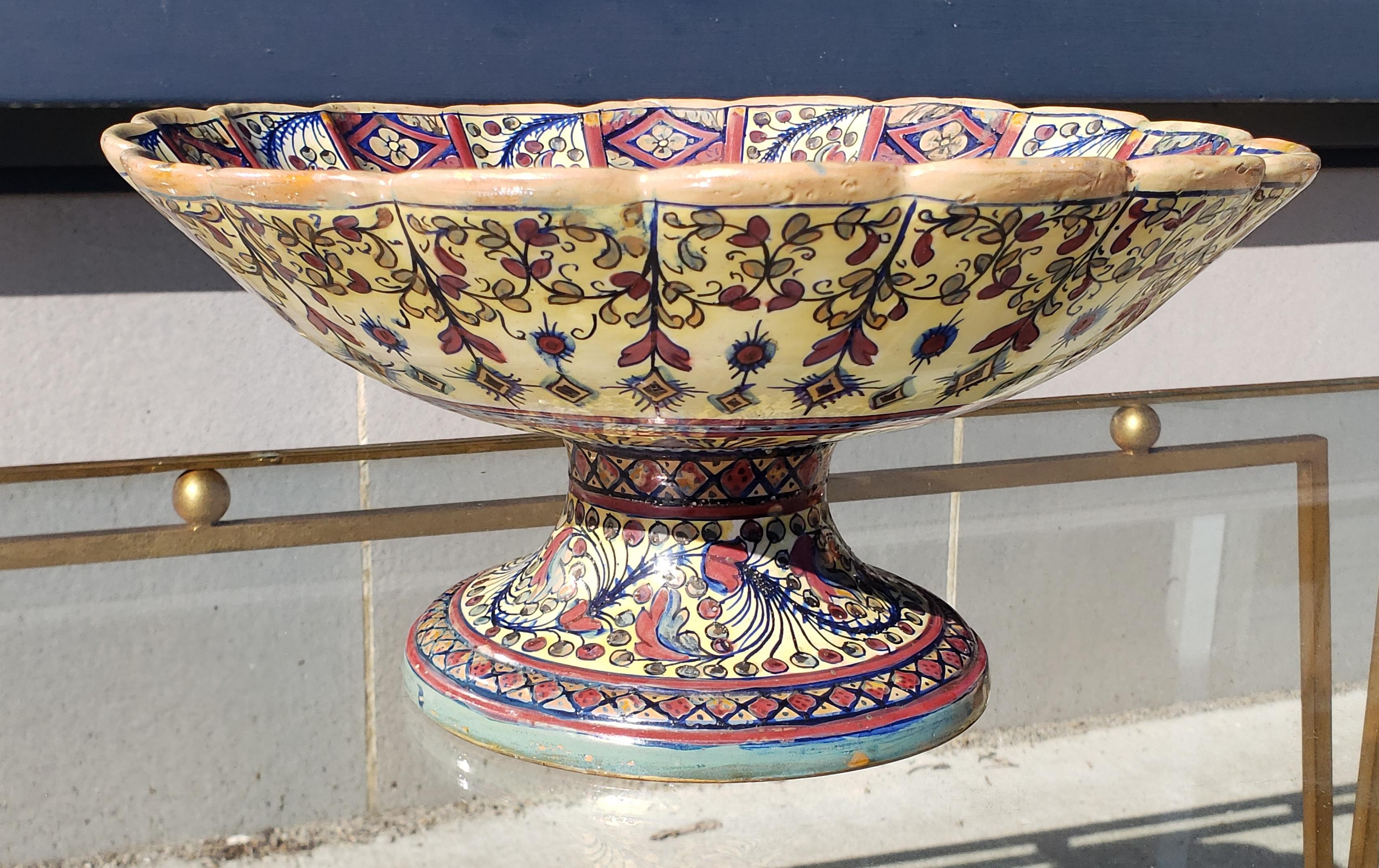 Late 19th century footed Urbino ware bowl attributed to Alfredo Santarelli. Hand thrown and Majolica glazed with lustre.