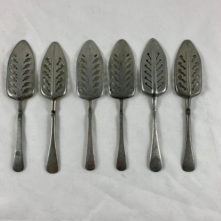 Late 19th Century French Absinthe Slotted Metal Sugar Spoons, a mixed