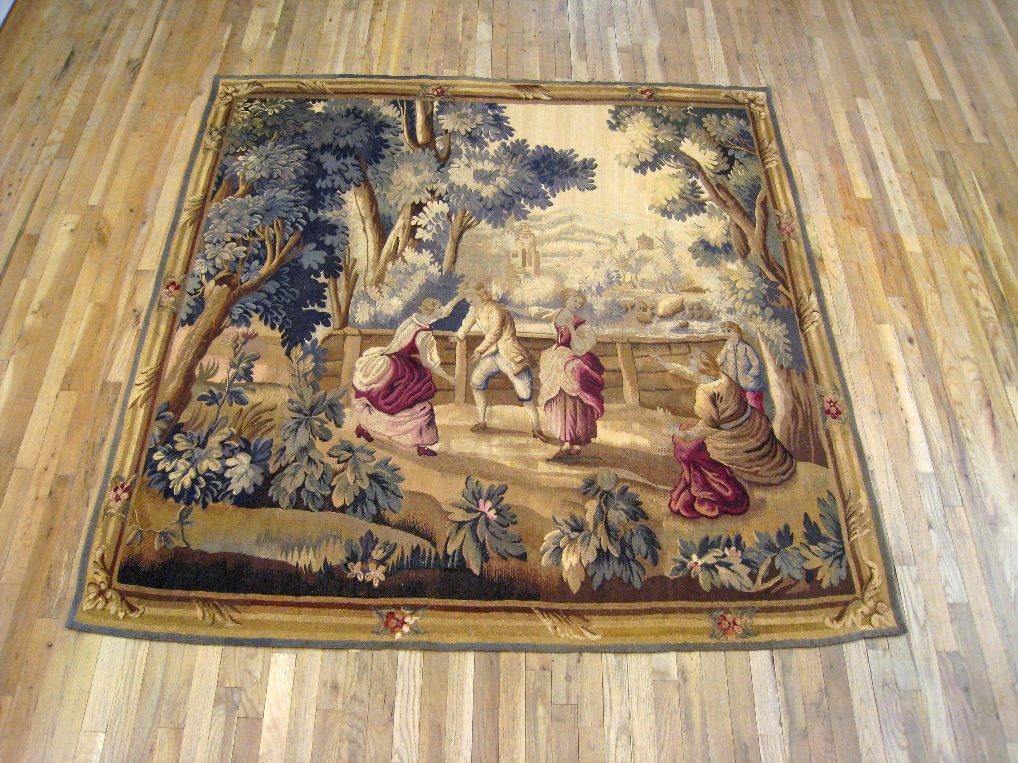 A French Aubusson rustic tapestry from the late 19th century, 'Le Jeu de Colin-Maillard', ('The Blind Man’s Buff') after a cartoon by Jean-Baptiste Huet (1745-1711). This tapestry was part of a set of the 'Amusements champêtres', ('The Pastoral