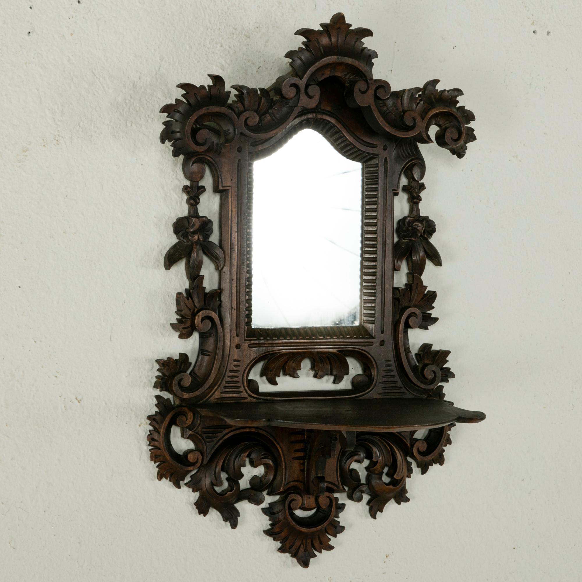 Late 19th Century French Black Forest Hand Carved Walnut Wall Mirror with Shelf In Good Condition In Fayetteville, AR