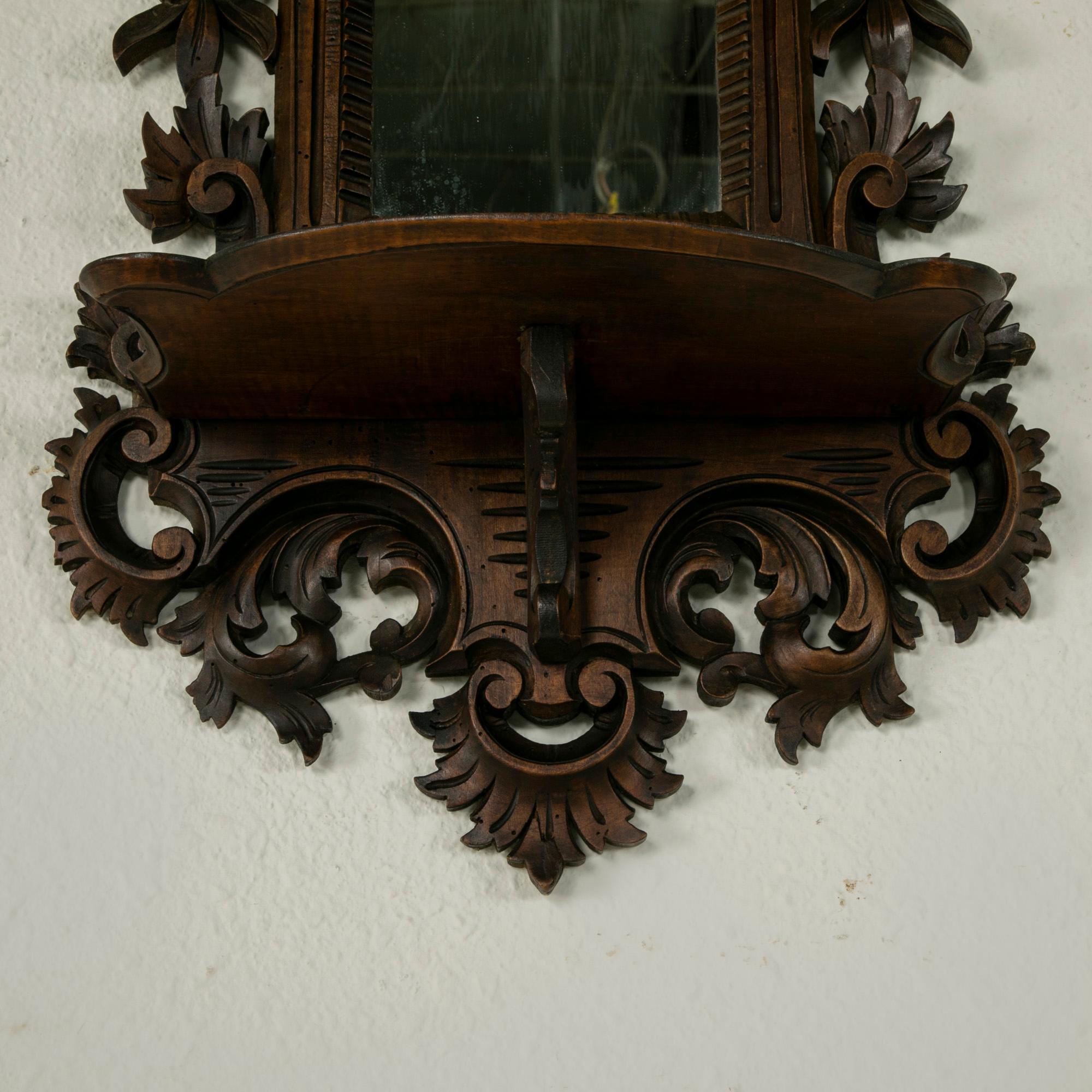 Late 19th Century French Black Forest Hand Carved Walnut Wall Mirror with Shelf 3