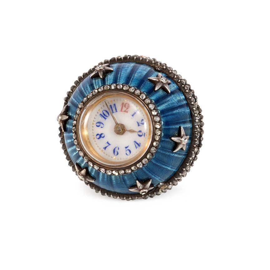 An antique blue guilloché enamel ball pendant watch with star decoration and embellished with rose-cut diamonds, in sterling silver, suspending from a modern black cord.  France

Dimensions: Approximately 1 1/8
