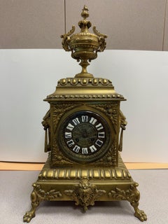 Late 19th Century French Bronze Mantel Clock with Lion Handles