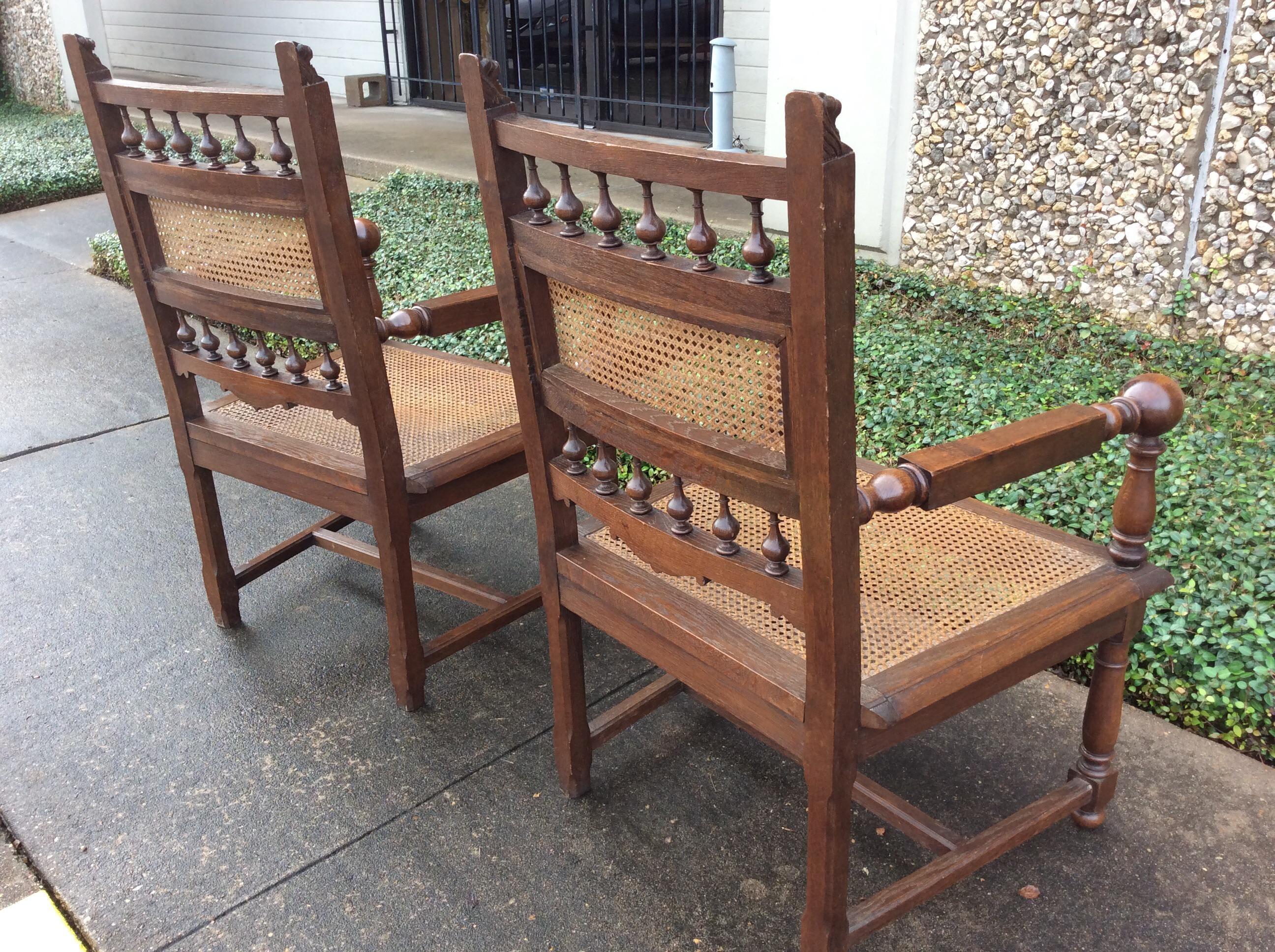A wonderful Pair of French Cane Seat Armchairs, Late 19th century. Perfect as accent chairs in any room. Carved details and cane seat and back. Some imperfections in cane due to age and use.

Each chair measures: 27.5