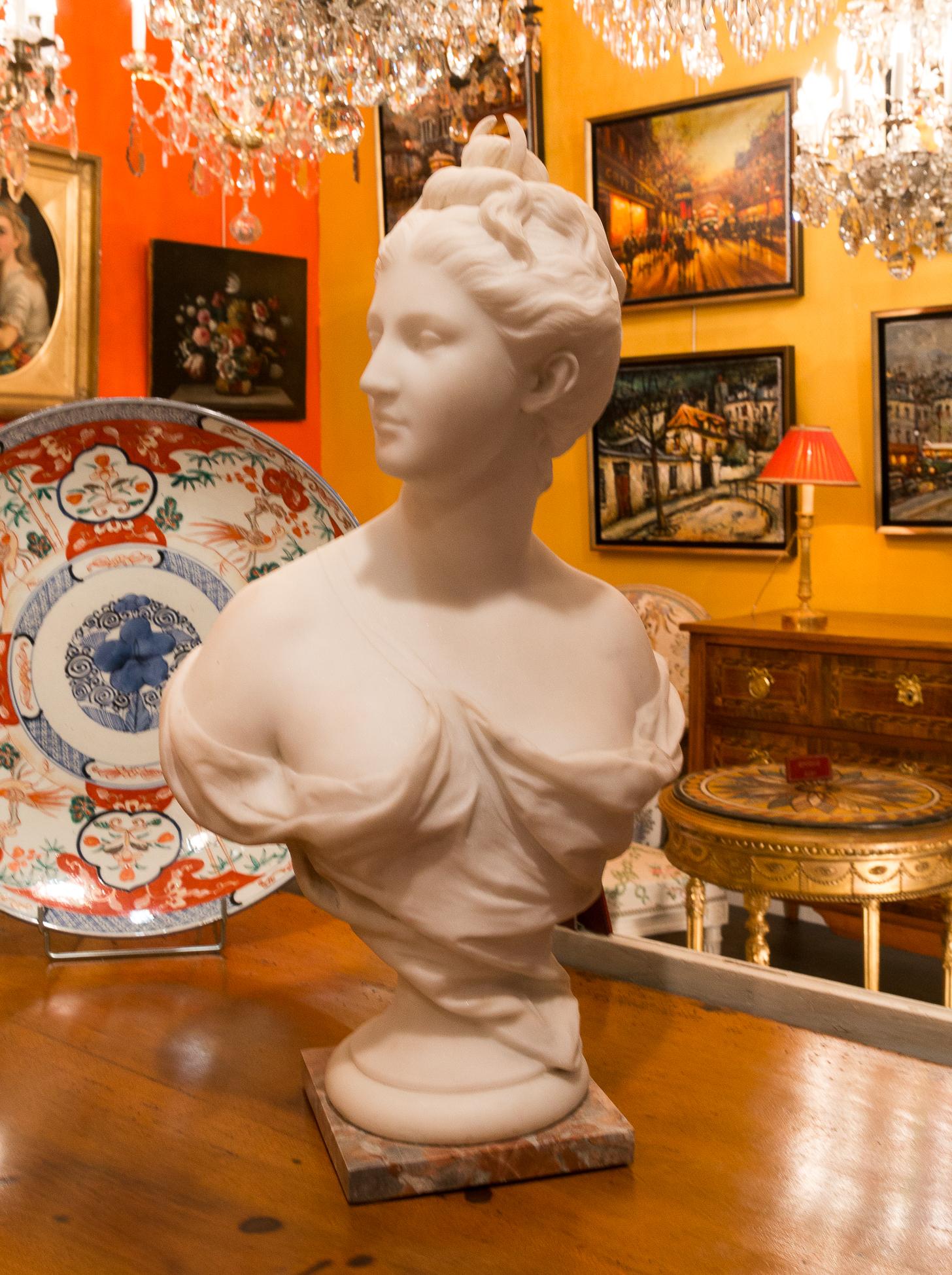 Gorgeous hand carved Carrara white marble bust of Diana the goddess oh the hunt. 

Beautiful French school, late 19th century circa 1880.

Dimensions: H 25.59 In, W 17.71 In, D 7.08 In.

In excellent original condition.
     