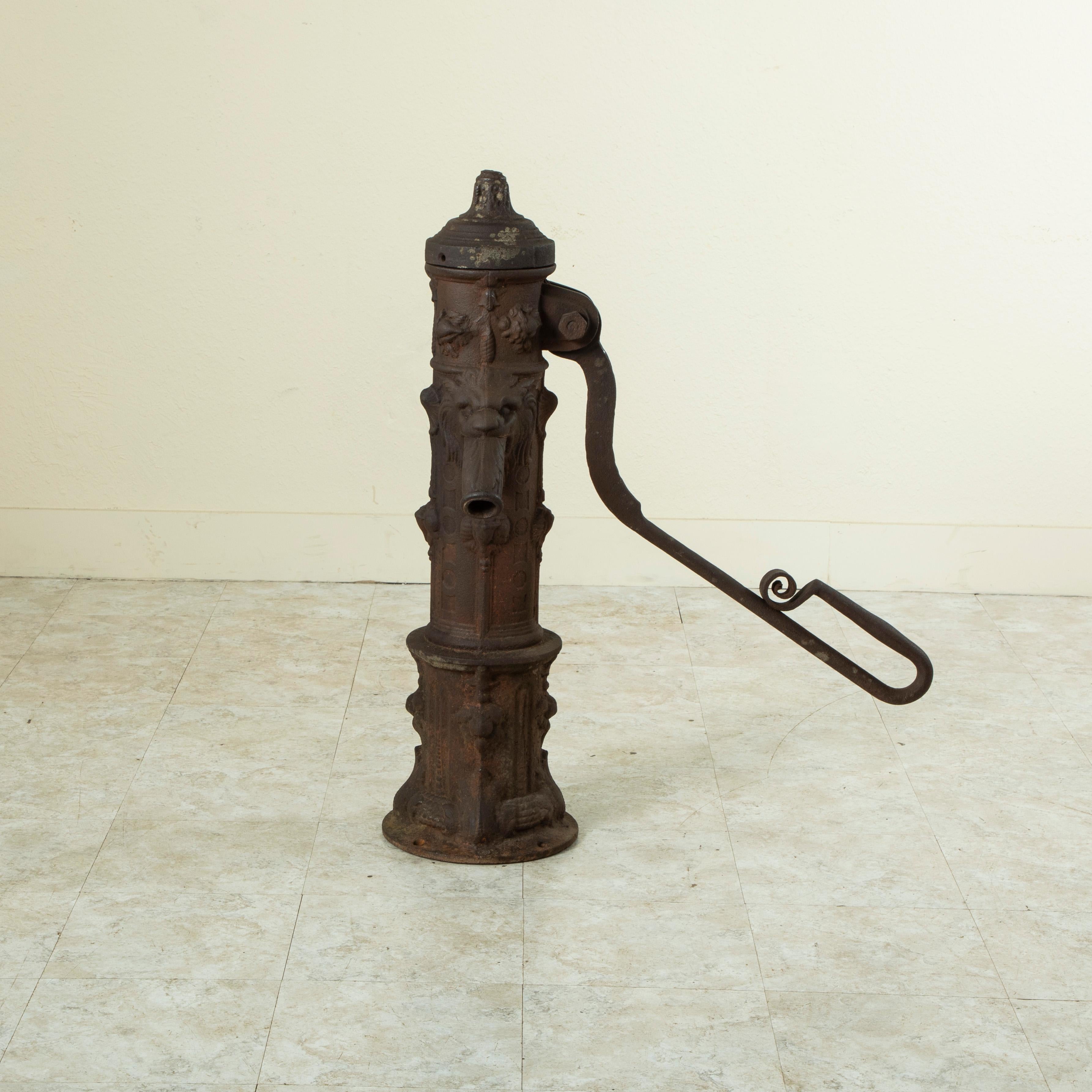 Found on a farm in Normandy, France, this late nineteenth century cast iron pump is marked by the maker A. Chappee (Armand Chappee 1835-1922). Chappee was a well known iron manufacturer based in the city of Le Mans. This pump features a spout