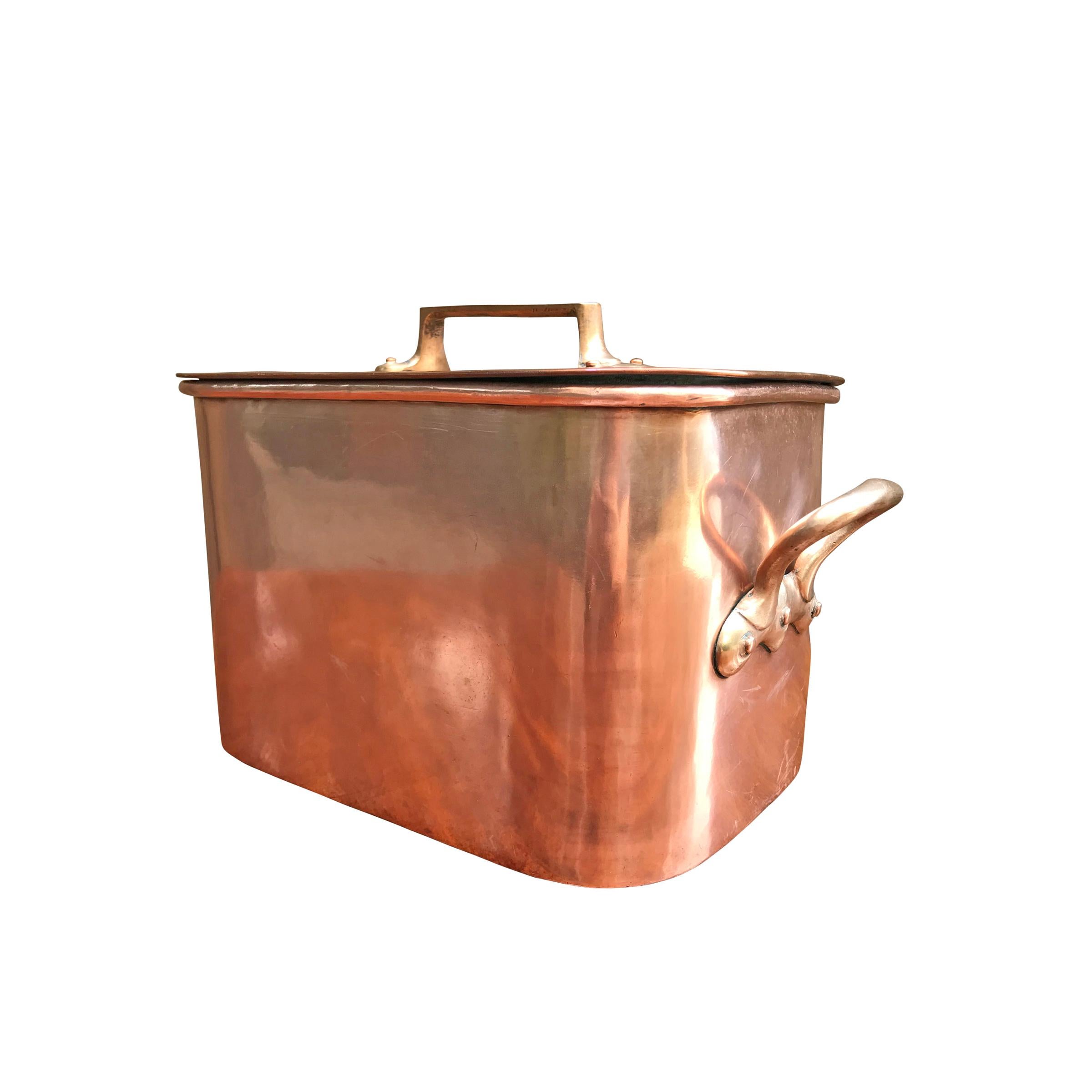 A wonderful late 19th century French copper Daubiere by J. Jacquotot with bronze handles, dovetailed joinery up the sides and around the bottom, and a lid with a bronze handle. Daubiere are braising pans used to roast meat with vegetables and broth