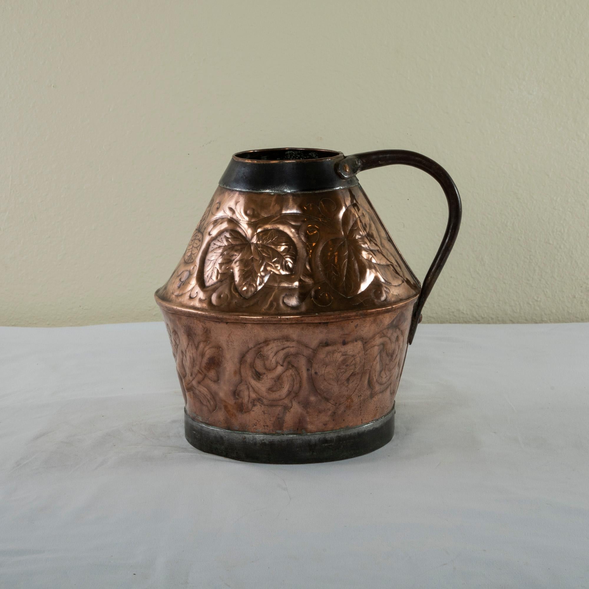 Repoussé Late 19th Century French Copper Repousse Pitcher with Iron Straps and Handle For Sale