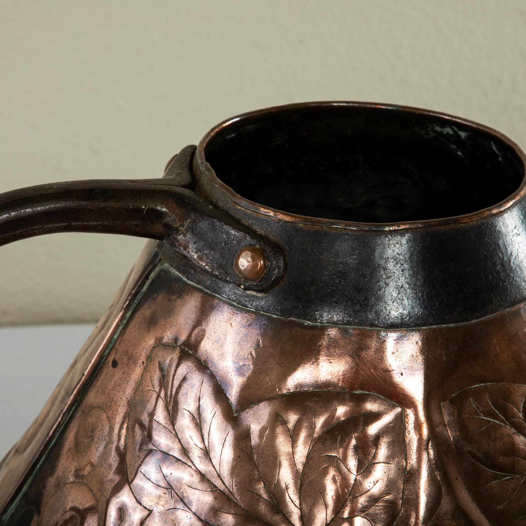 Late 19th Century French Copper Repousse Pitcher with Iron Straps and Handle For Sale 2