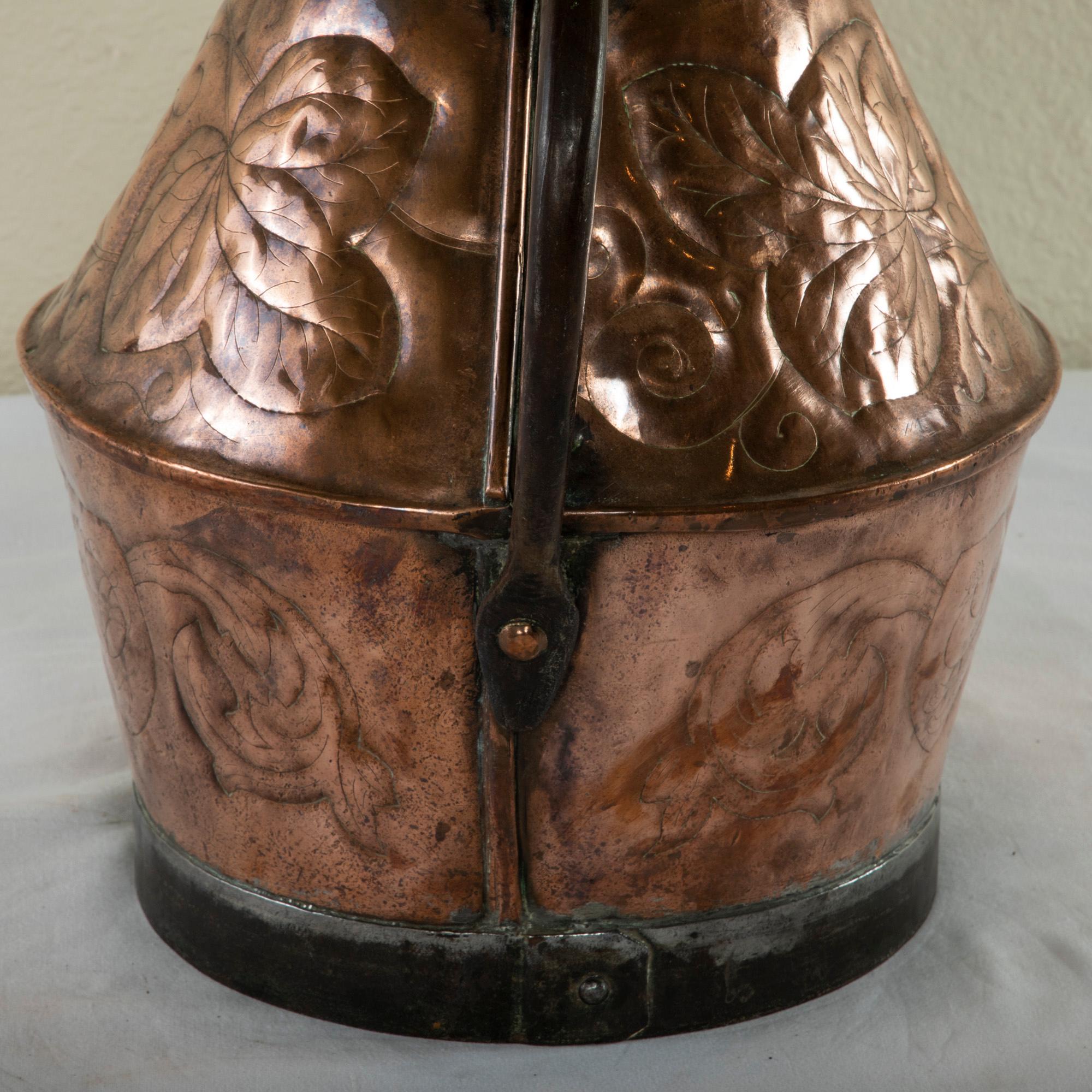 Late 19th Century French Copper Repousse Pitcher with Iron Straps and Handle For Sale 3